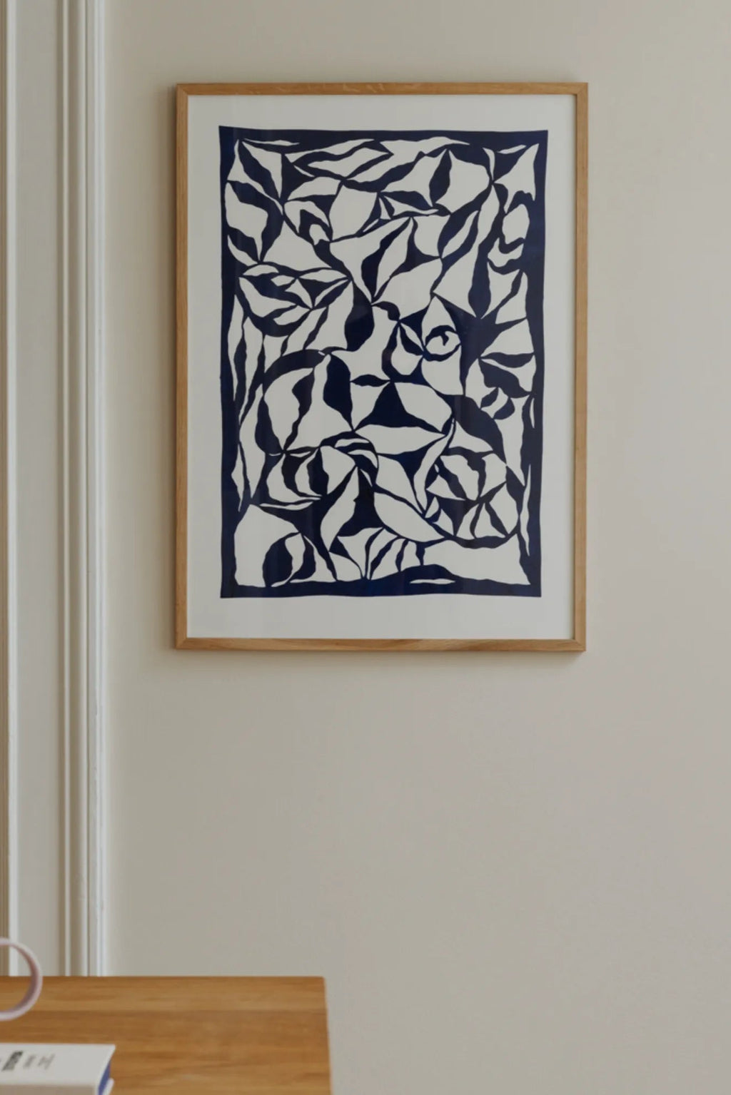 Elegant white magnolia flower with vibrant green leaves in bloom on a sunny day