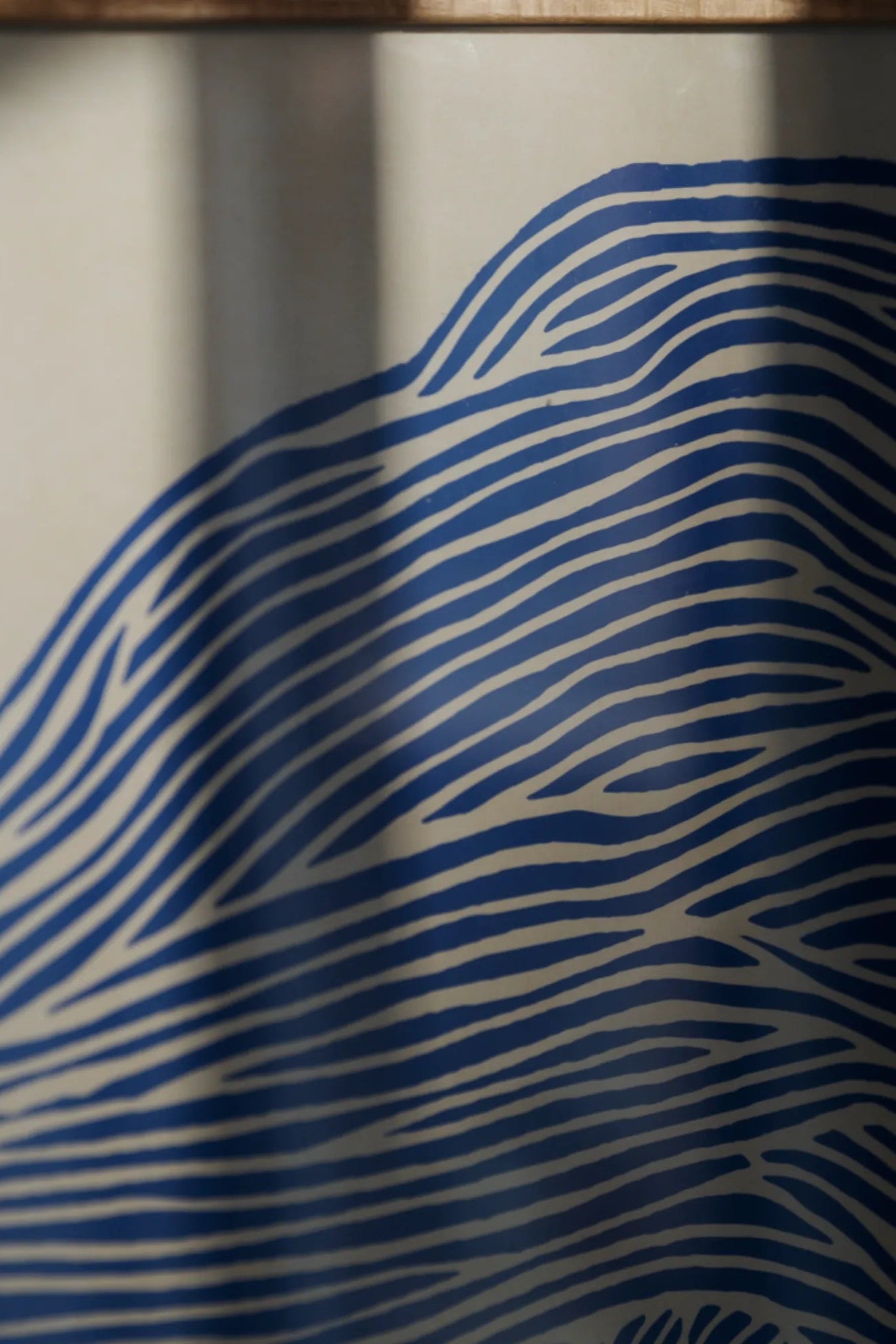 The Line - Navy: A side view image showcasing the sleek and modern design of the product in rich navy color