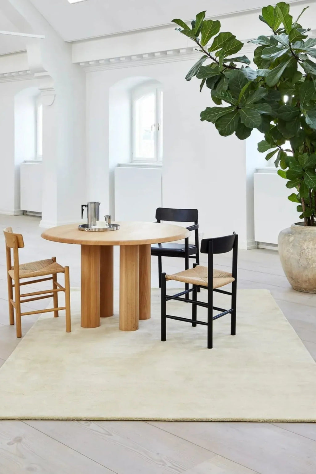 Hand-woven RePeat Rug made of eco-friendly recycled materials in neutral tones