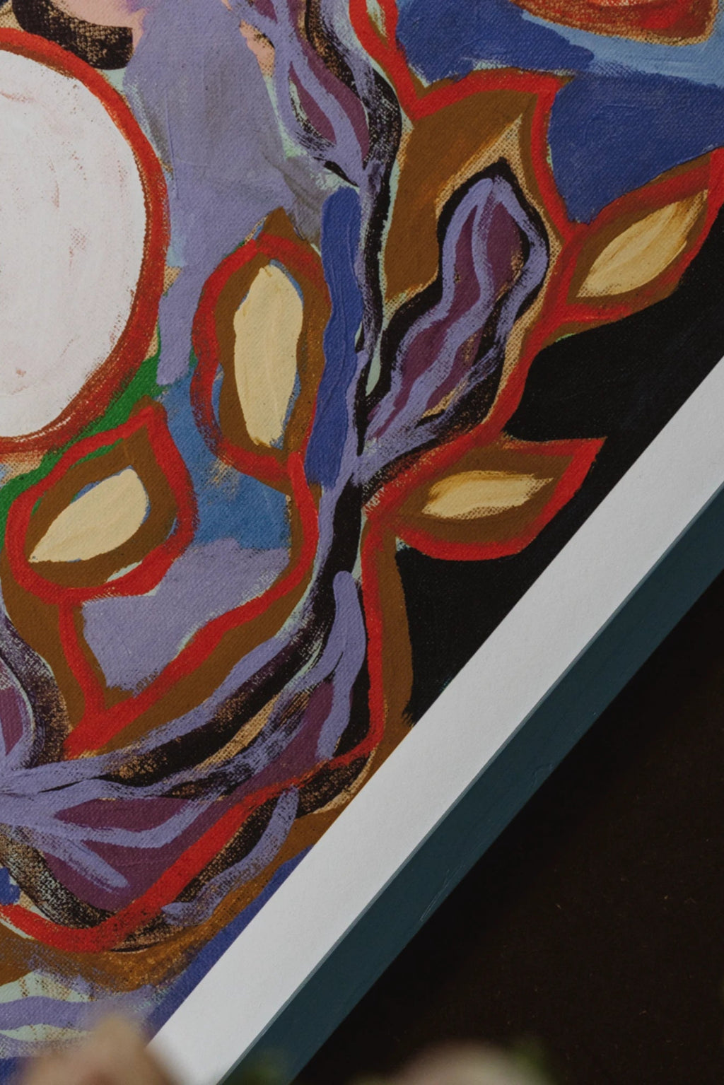 The Poster Club Felicity, a vibrant abstract art print featuring bold, organic shapes and flowing lines in a rich color palette. The canvas showcases deep blues, lavender purples, earthy browns, reds, and yellow-cream accents, with visible brushstrokes creating a textured, painterly feel. Presented with a crisp white mat and a dark teal frame edge, it's perfect for adding a striking focal point to contemporary gallery walls, modern living rooms, or organic modern interiors.