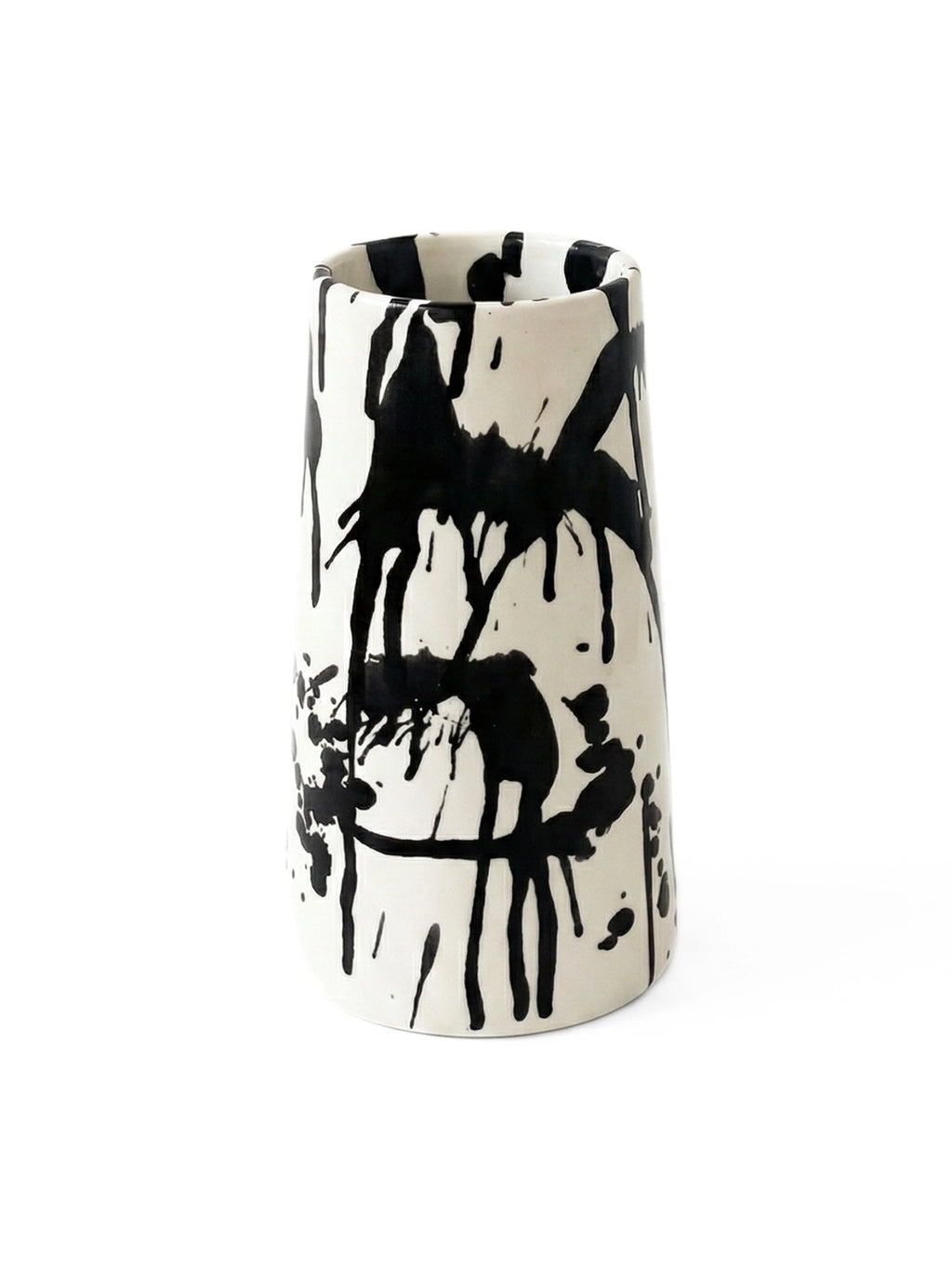 OWO Ceramics x That Cool Living Rock Vase II, a handcrafted ceramic vase with a unique abstract black splatter design on a matte white background. This elegant, modern piece adds a stylish touch to any contemporary decor. Perfect for art lovers and those seeking distinctive home accents.