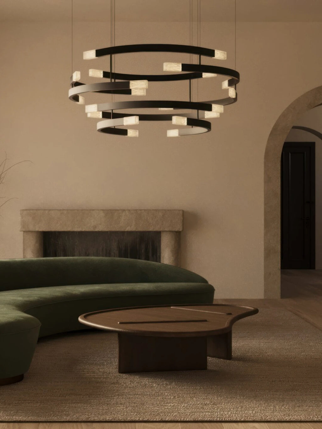 CTO Lighting Trace Circular Halo Chandelier, a captivating modern minimalist chandelier composed of multiple concentric matte black metal rings, each adorned with rectangular textured glass diffusers that cast a warm, inviting glow. This contemporary luxury pendant light makes a sophisticated architectural statement. Ideal for illuminating expansive living rooms, elegant dining areas, or grand entryways in high-end modern interiors.