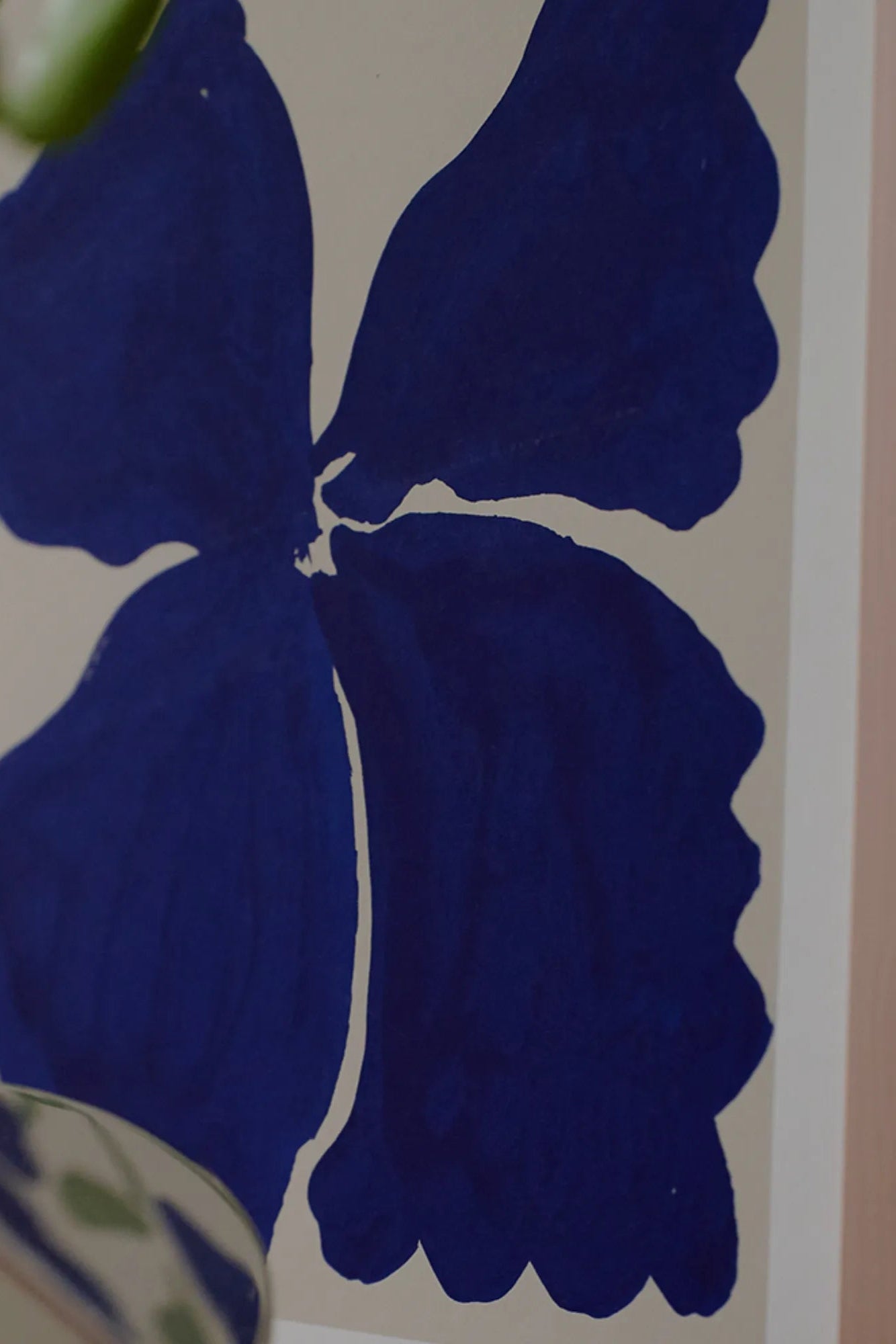 Bunch of colorful daisies in a rustic wicker basket on a wooden table