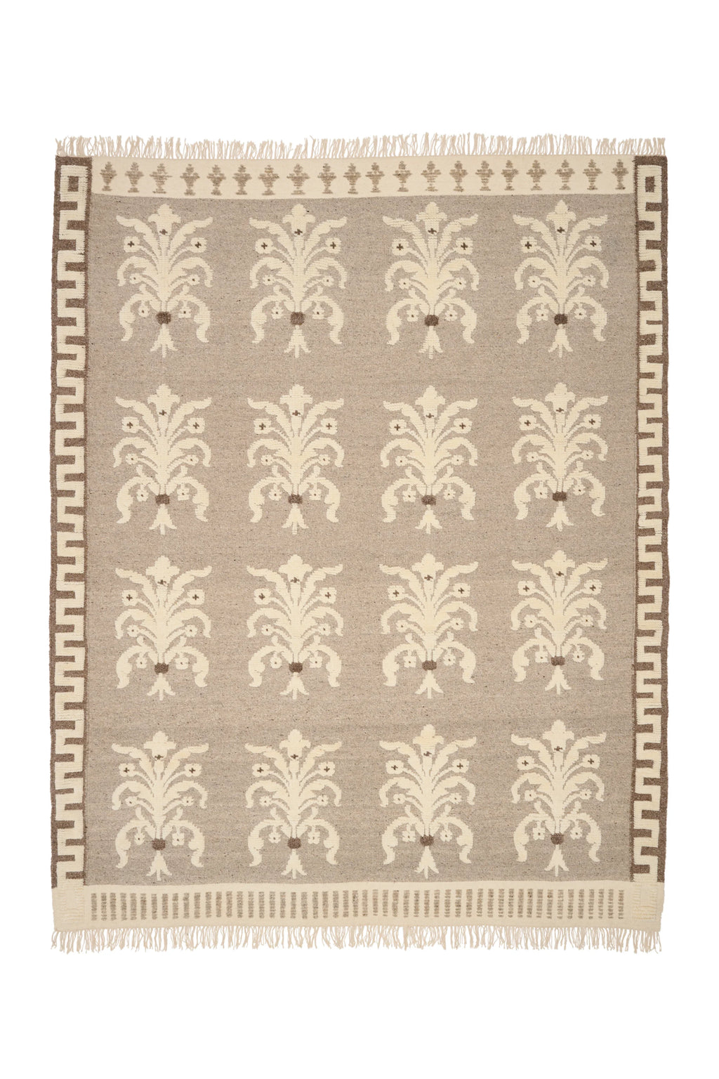 Patterned rug with decorative design on a plain background