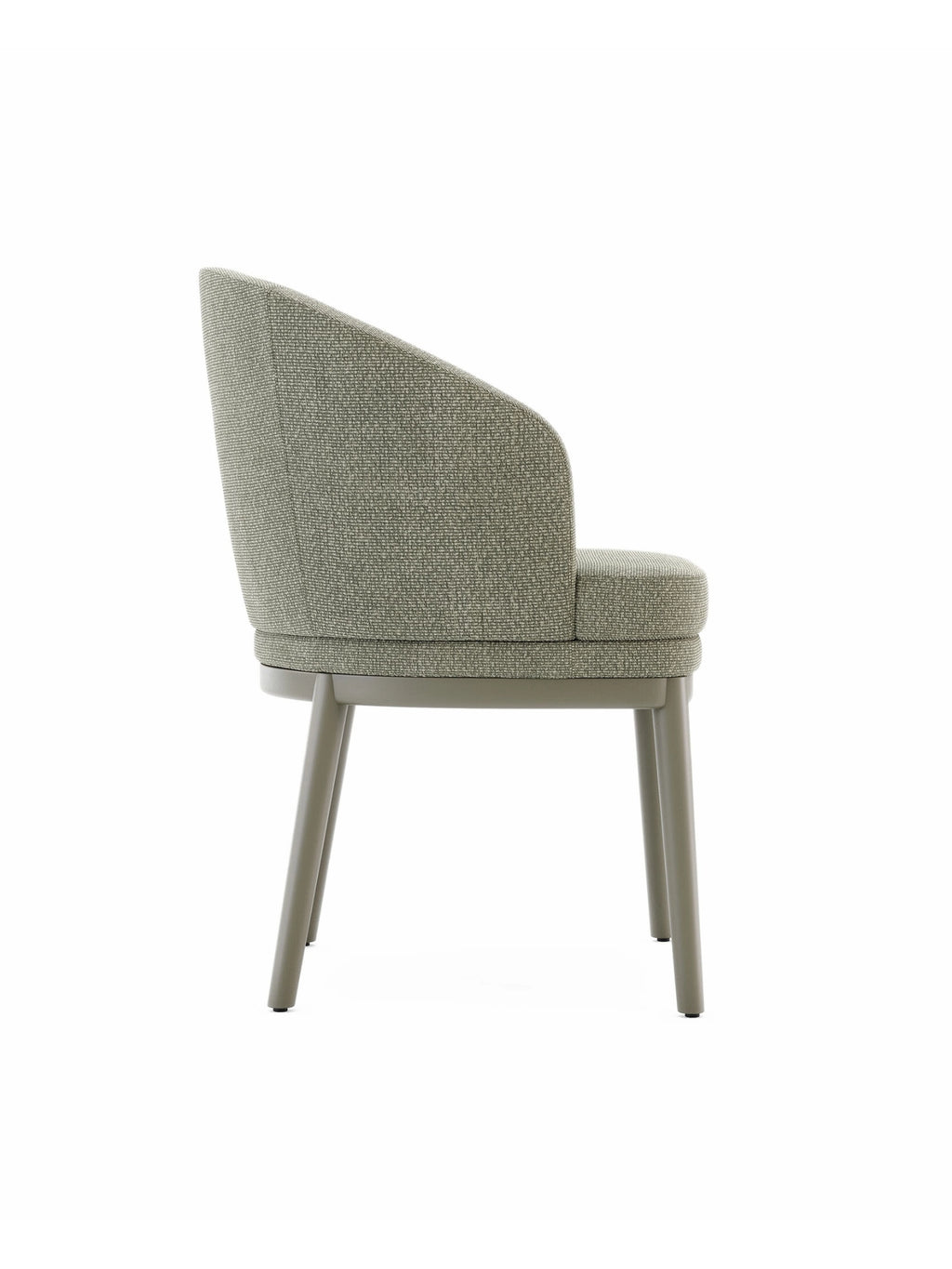 Domkapa Ruth Chair, a contemporary dining chair with a gracefully curved backrest and integrated armrests, upholstered in a textured sage green fabric with a soft, inviting weave. Its minimalist design features a sturdy matte grey-green metal frame and slender, tapered legs. This modern upholstered chair is ideal for contemporary dining rooms, stylish home offices, or as a sophisticated accent chair in living spaces.