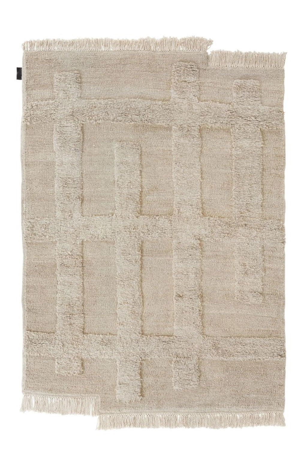 Sera Helsinki Valli Wool Rug, a hand-knotted natural wool area rug in a warm beige and cream palette, featuring a plush, high-pile geometric pattern that creates a soft, textured relief.