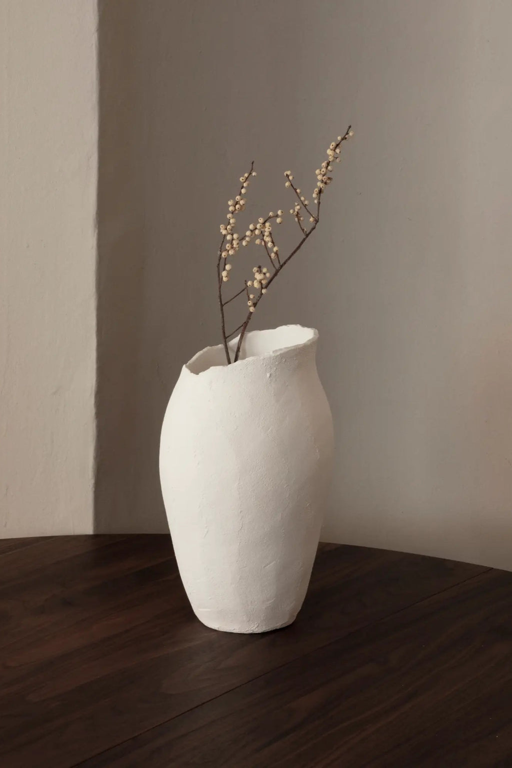  Side view of Magnolia Vase with a glossy finish and scalloped edges