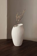  Side view of Magnolia Vase with a glossy finish and scalloped edges