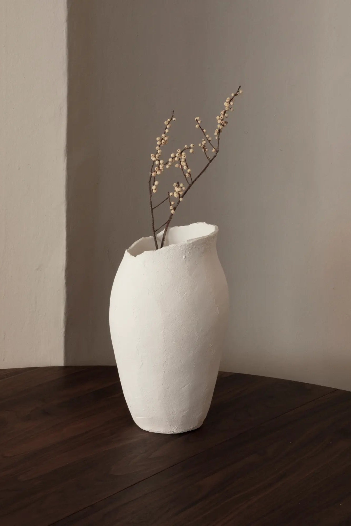  Side view of Magnolia Vase with a glossy finish and scalloped edges