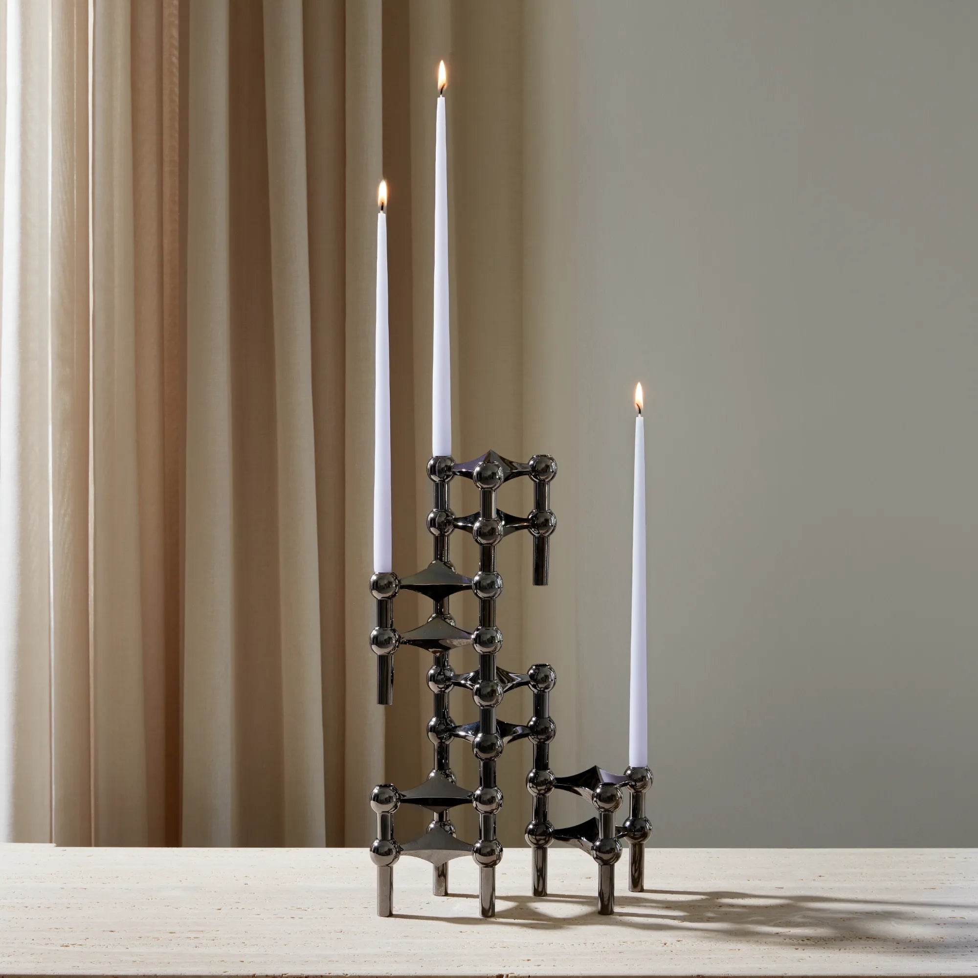 Black chrome candle holder with unique modular configuration
