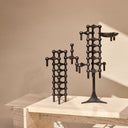 Modern and sleek black modular candle holder arrangement