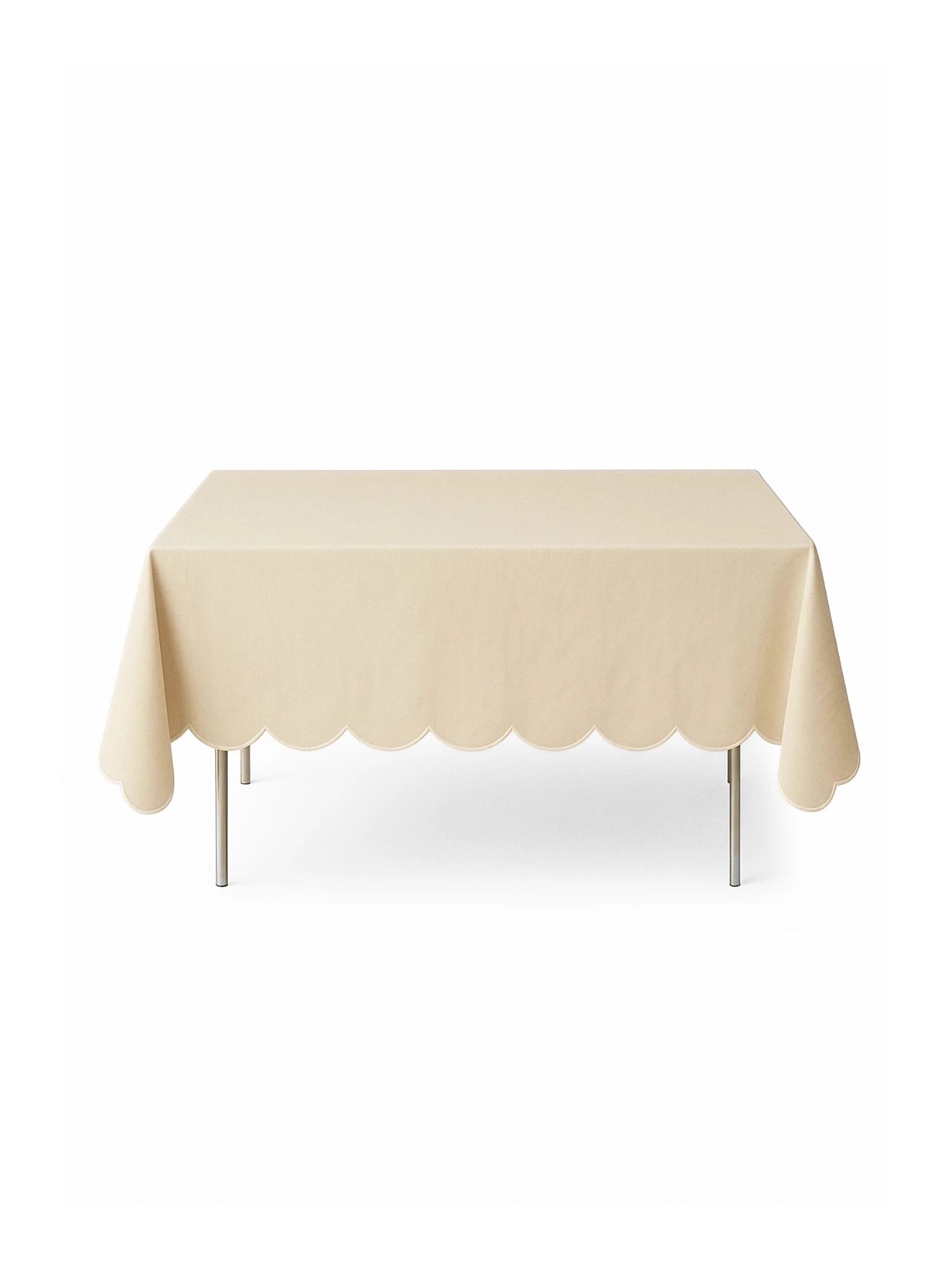 Beige tablecloth on a square table against a white background