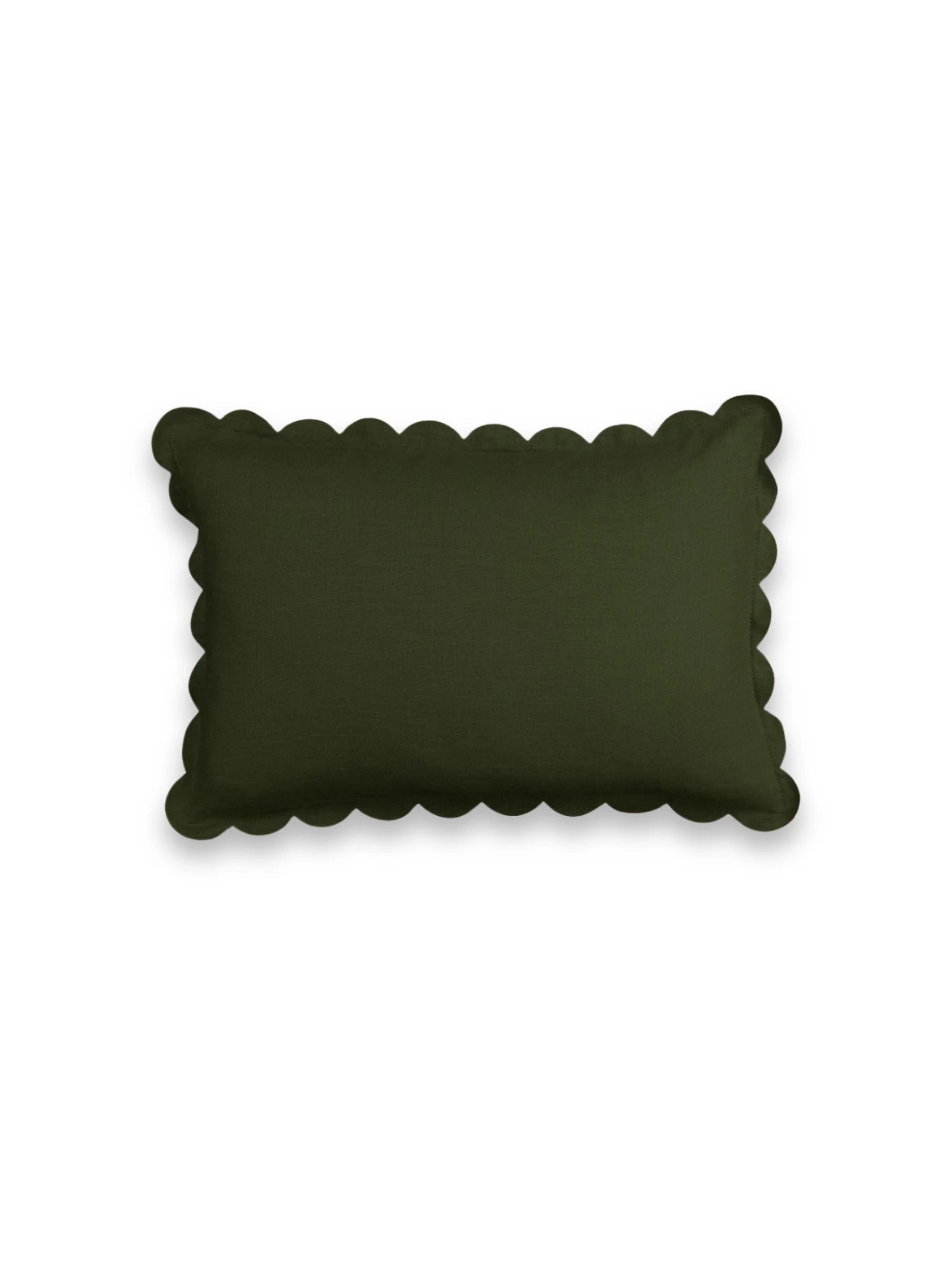 Dark green pillow with scalloped edge on a white background
