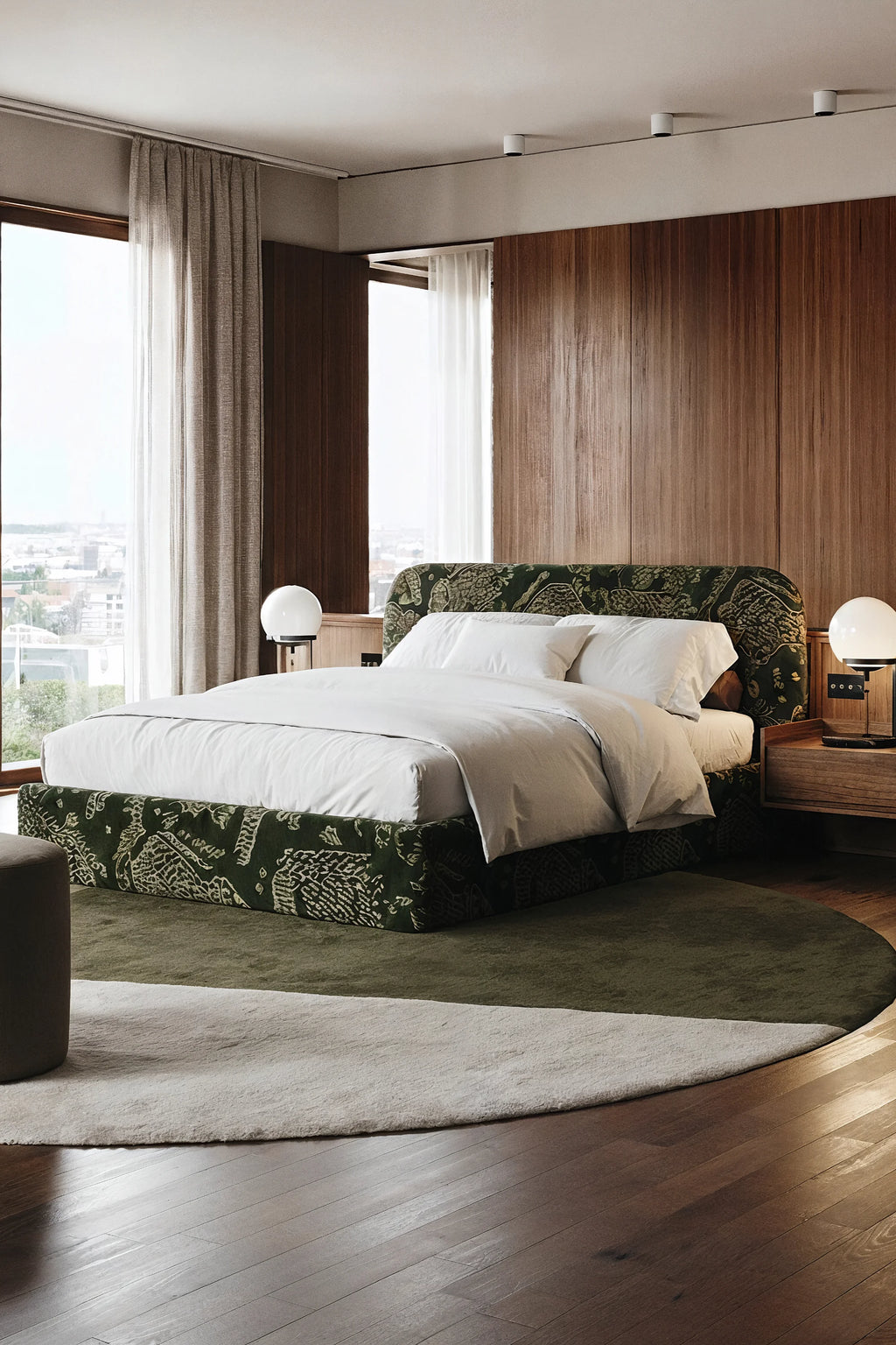 Modern bedroom with a bed, nightstands, and lamps.