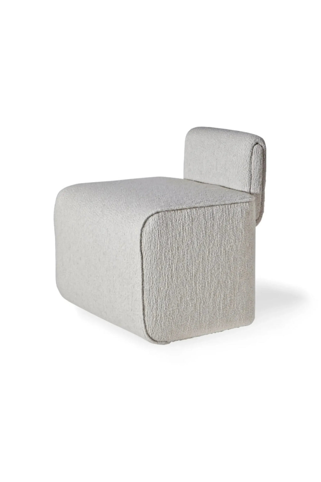 Hessentia Hug Pouf, a contemporary organic modern accent stool upholstered in plush light grey bouclé fabric with a rich, textured finish and soft, rounded edges. Its sculptural, minimalist design features a low, integrated backrest, making it a versatile piece for lounge areas, living room seating, or bedroom accents.