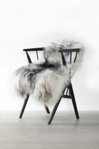  Handmade sheepskin slippers with cozy fleece lining and durable sole 