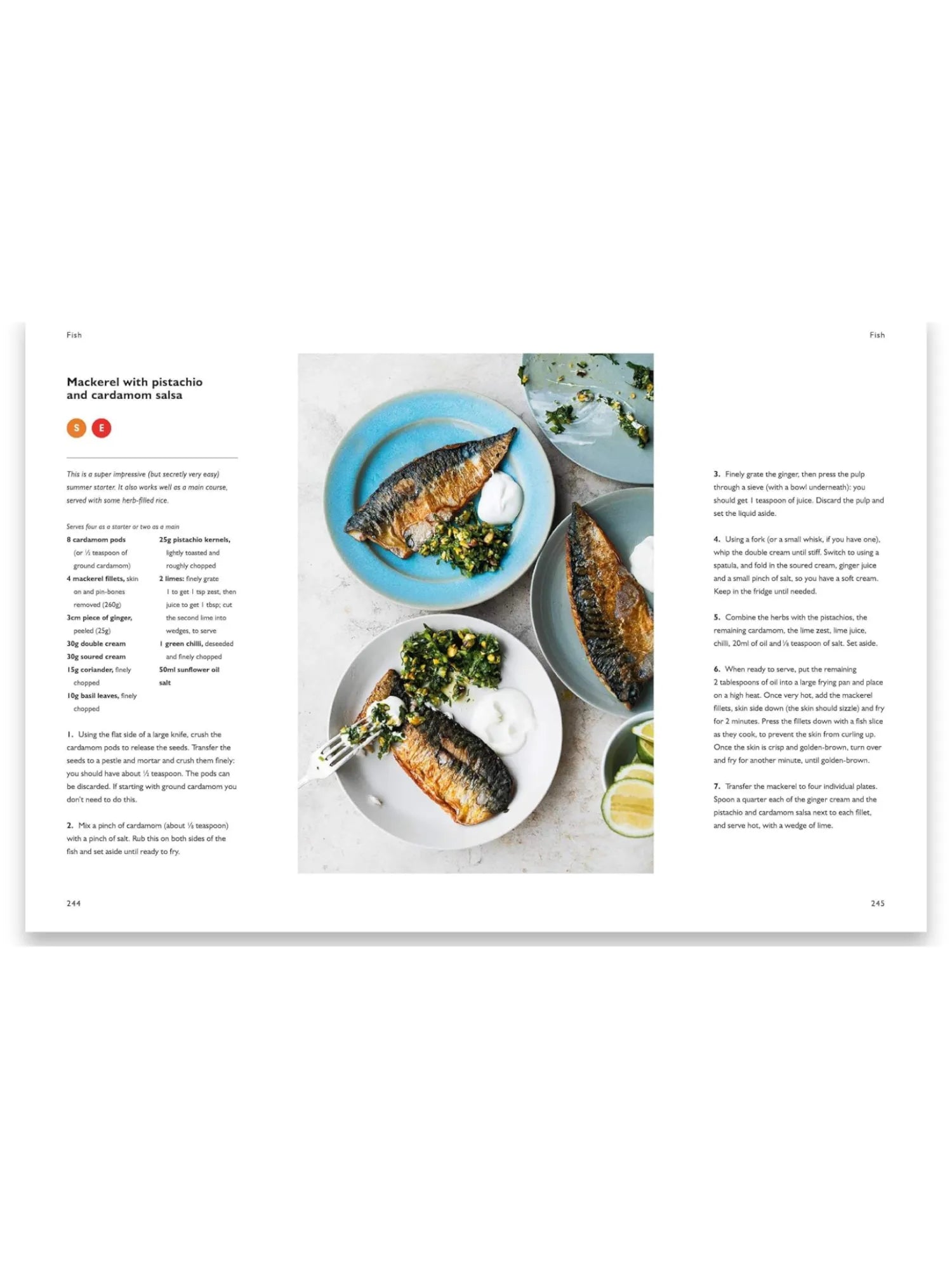 Book Simple, an open cookbook page displaying the "Mackerel with pistachio and cardamom salsa" recipe with vibrant food photography. This high-quality cookbook features a delicious fish dish on blue and grey ceramic plates, garnished with fresh lime wedges. An essential resource for home chefs and culinary enthusiasts seeking easy, impressive recipes.