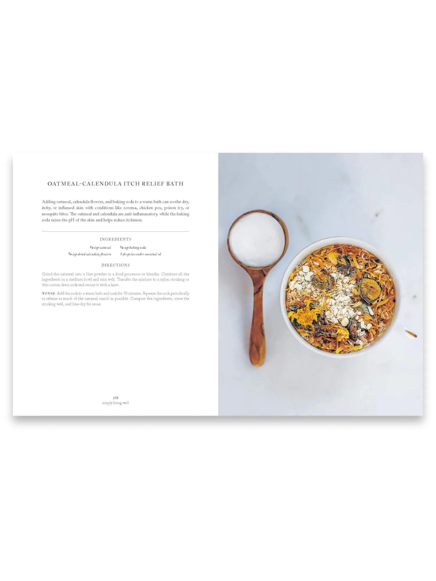Book Simply Living Well, an open natural wellness book displaying an "Oatmeal-Calendula Itch Relief Bath" recipe with ingredients like dried calendula flowers and oats in a white bowl, alongside a wooden spoon filled with white baking soda. This holistic lifestyle guide is perfect for anyone seeking natural remedies and DIY self-care solutions.