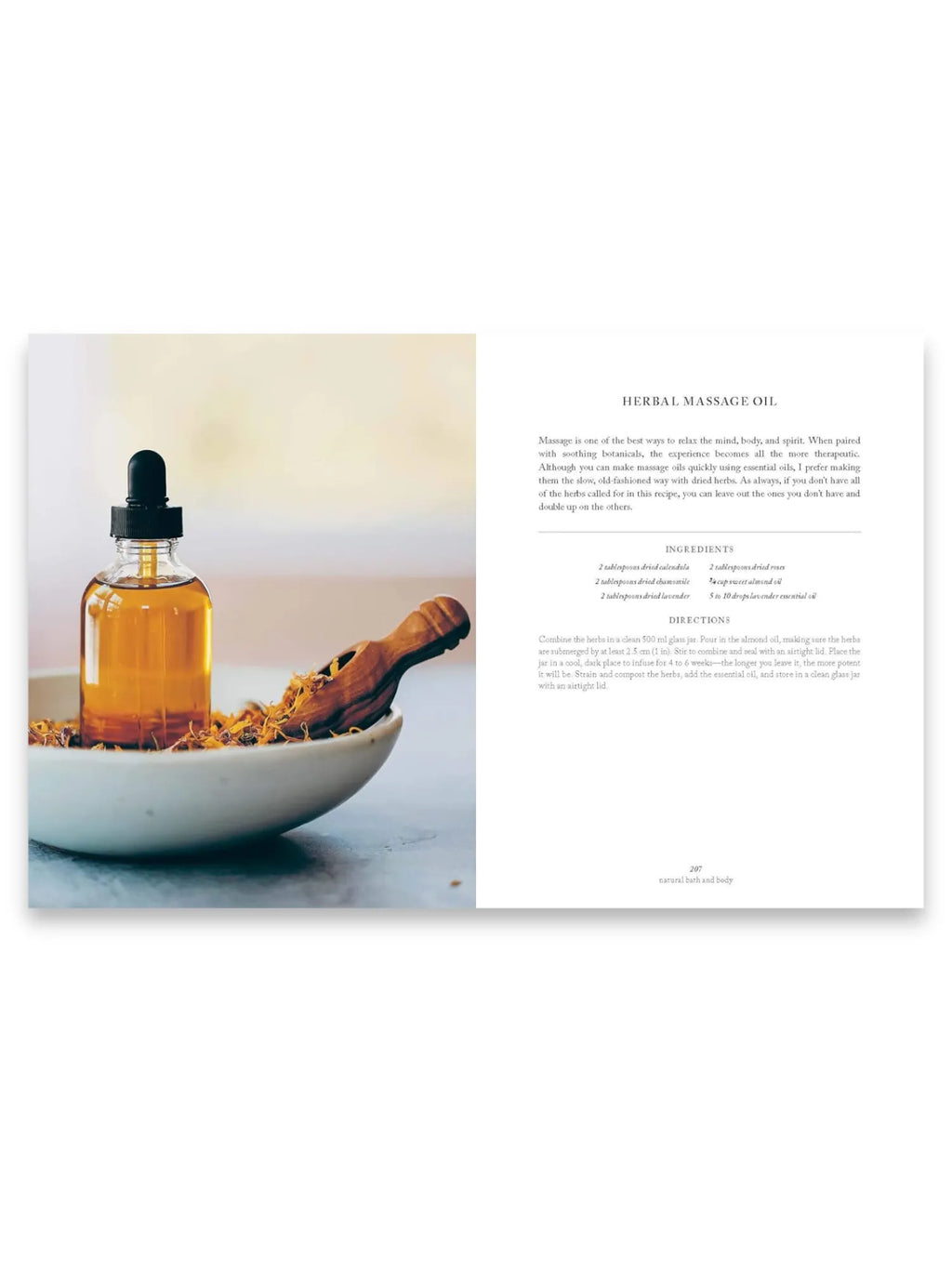Book Simply Living Well, an open page displaying a DIY herbal massage oil recipe with a clear amber dropper bottle, a wooden scoop, and dried botanicals in a light ceramic bowl on a textured grey surface. This wellness guide is perfect for readers interested in natural remedies, holistic living, and self-care practices.