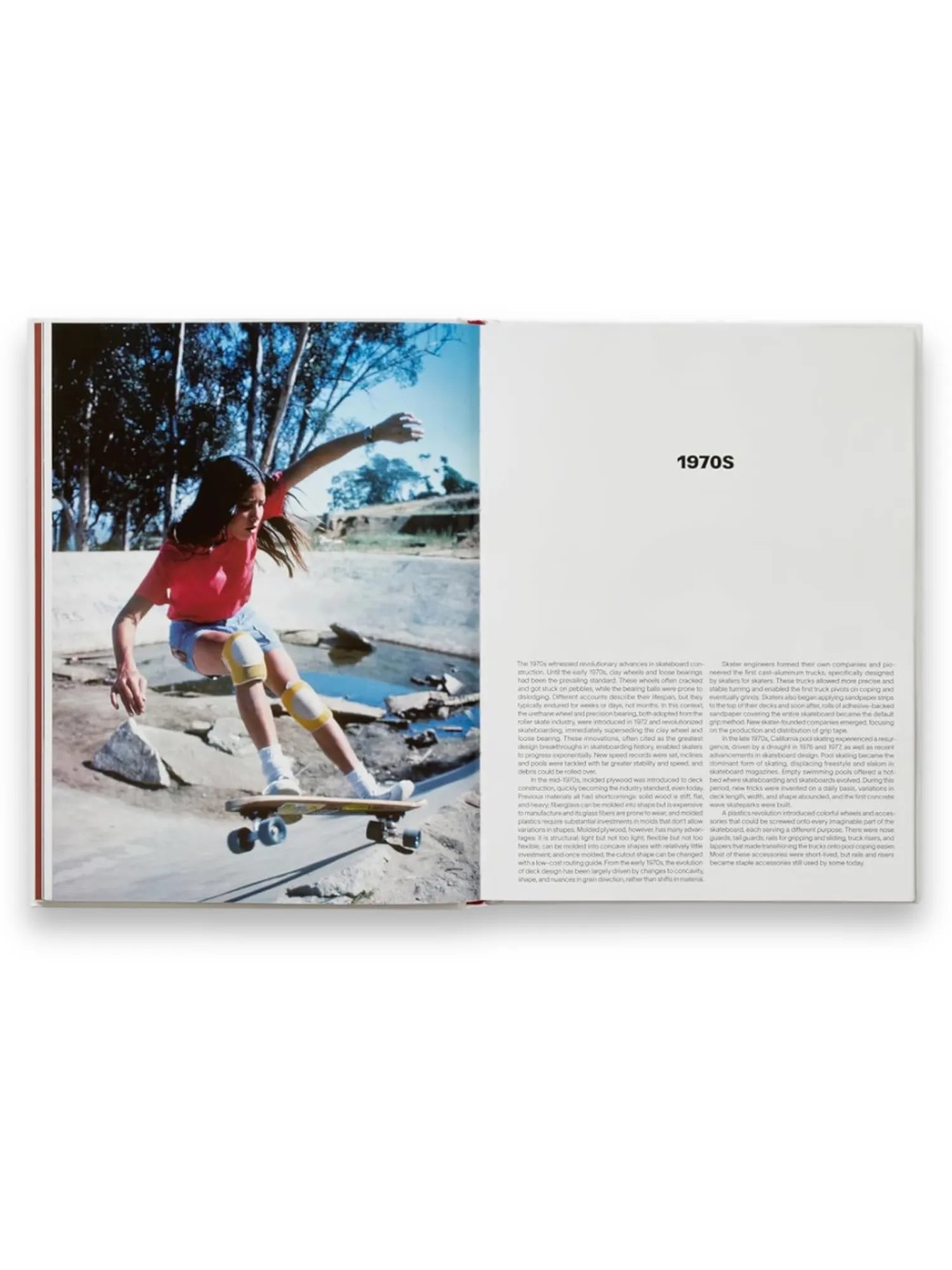Book Skateboard History Book, featuring an open spread with a vibrant 1970s photograph of a girl skateboarding in a concrete park, wearing a red tee, denim shorts, and yellow knee pads. The facing page includes detailed text about skateboarding's evolution in the 1970s. This engaging non-fiction book is perfect for skateboarding enthusiasts and history buffs interested in vintage sports culture.