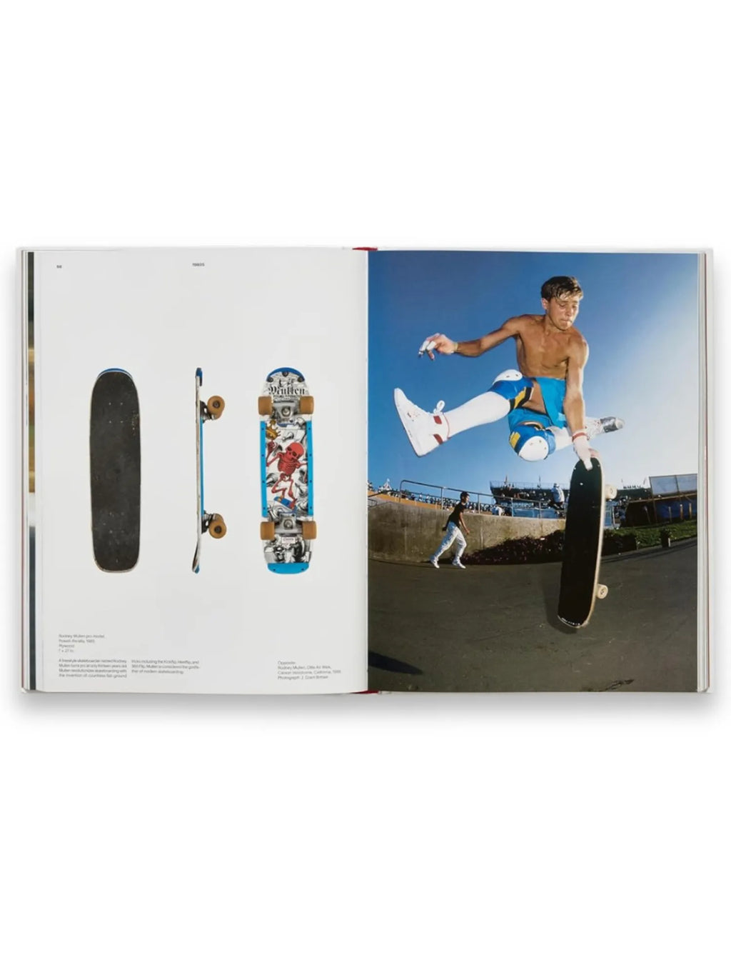 Book Skateboard, an open hardcover book displaying vibrant images of skateboards and a skateboarder. The left page features three views of a vintage skateboard with a blue deck and red skeleton graphic, while the right page shows a dynamic photo of a young man performing an aerial trick on a skateboard against a clear blue sky. This engaging book is perfect for skateboarding enthusiasts and collectors interested in the sport's history and culture.