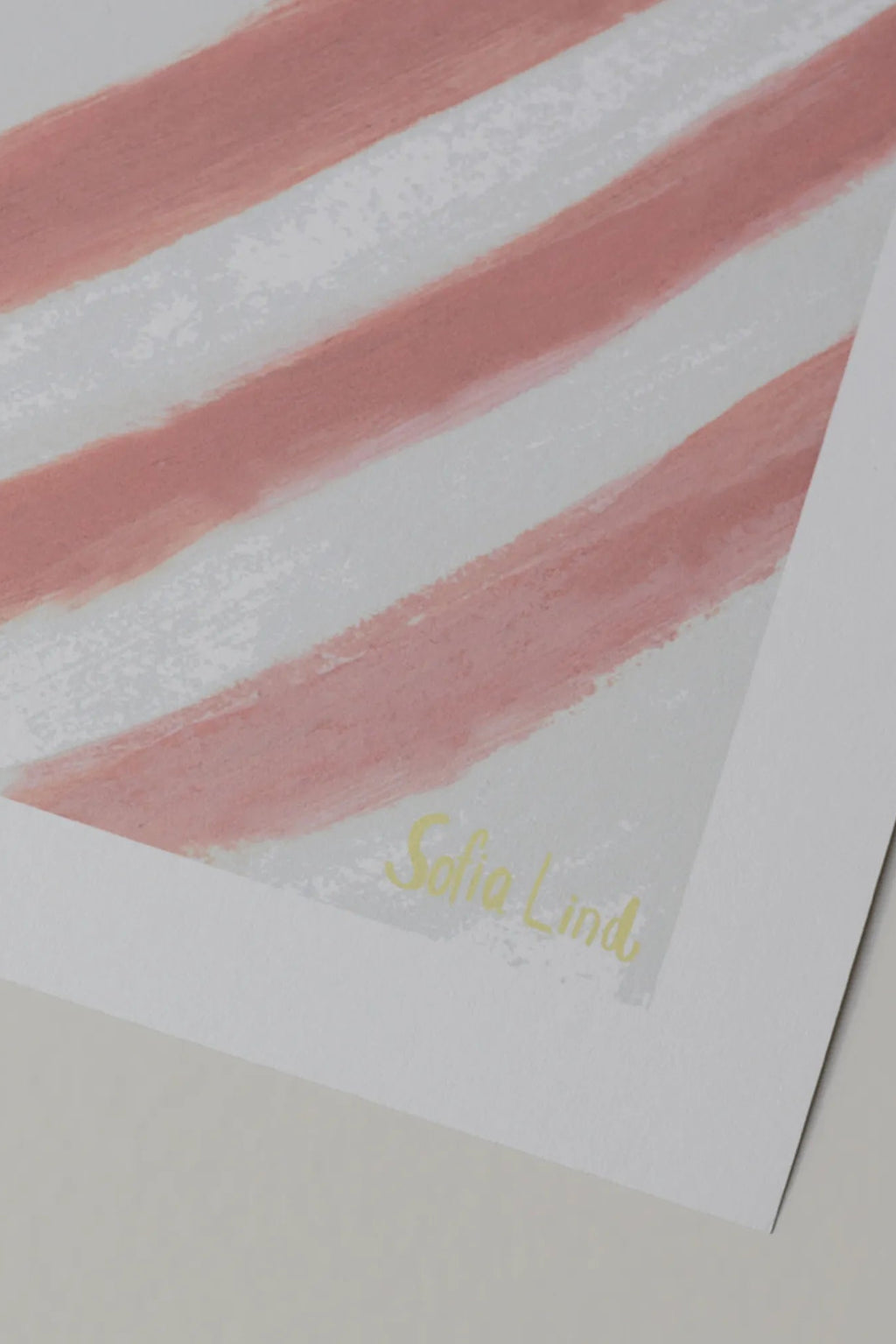 The Poster Club Still Waiting, an abstract art print featuring broad, textured blush pink brushstrokes against a soft grey background, signed by artist Sofia Lind. This minimalist and contemporary poster is perfect for Scandinavian living rooms, modern bedrooms, or elegant gallery wall decor.