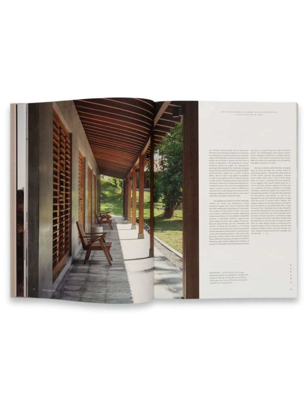 Book Soft Minimal – By Norm Architects, an open architectural design book featuring a sleek modern veranda with warm wooden slatted ceilings, concrete walls, and natural wood chairs, bathed in bright sunlight. This premium design book is perfect for architecture enthusiasts and interior design professionals seeking modern minimalist inspiration.