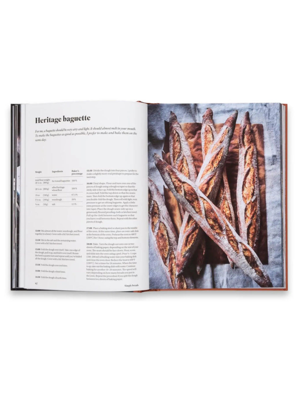 Book Sourdough for All, open cookbook displaying a "Heritage baguette" recipe with detailed instructions and a glossy photo of golden-brown baguettes on a rustic wooden board. This essential baking guide is perfect for aspiring home bakers and culinary enthusiasts seeking to master artisan bread.