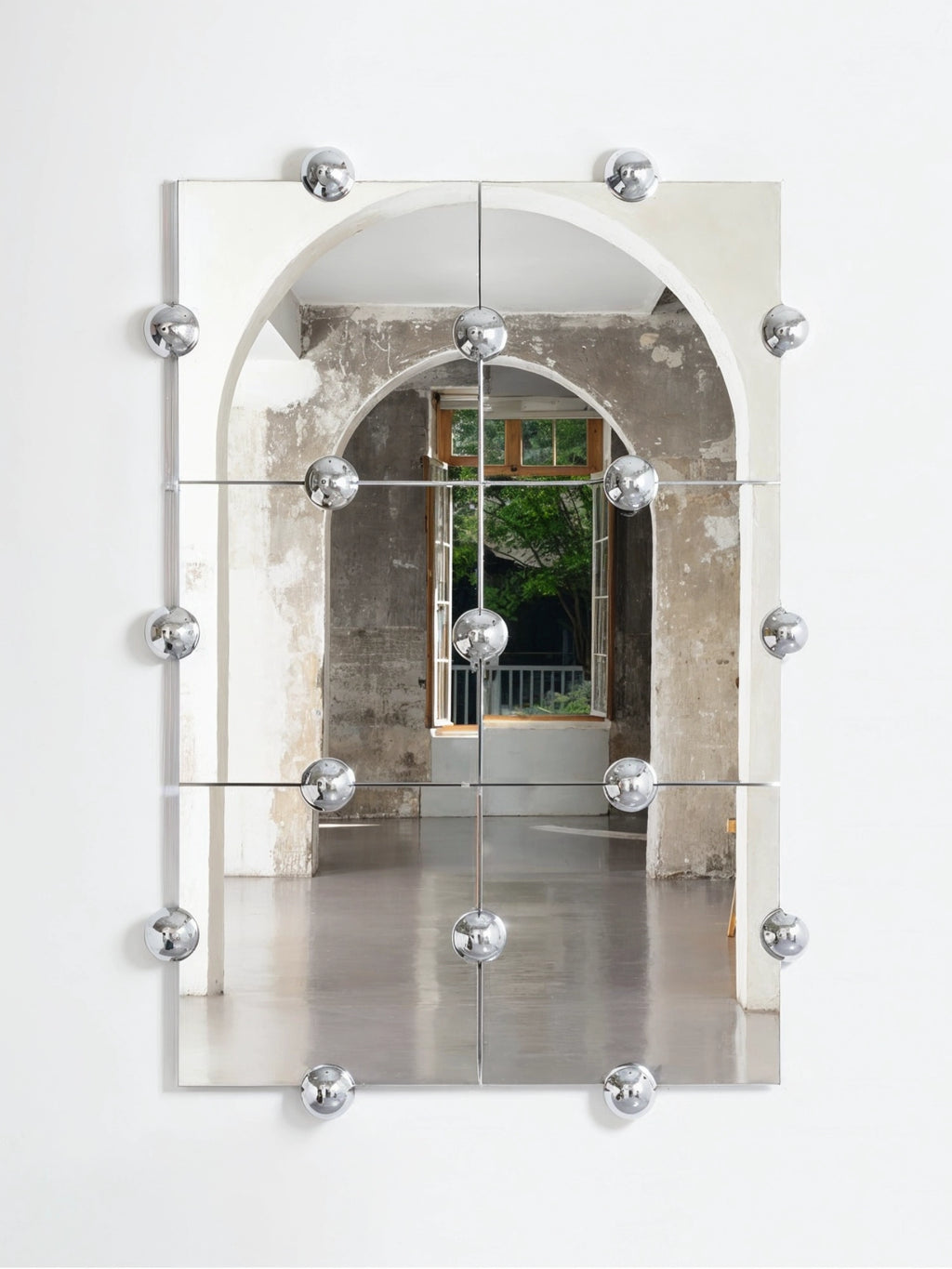 Moustache Sphera Crystal Palace L Vertical Mirror, a striking modern contemporary wall mirror featuring a segmented mirror surface with clean lines, accented by polished chrome rods and numerous reflective chrome spheres. This unique vertical mirror offers a bold, sculptural design, perfect as a statement piece for modern living rooms, elegant entryways, or minimalist bedrooms.