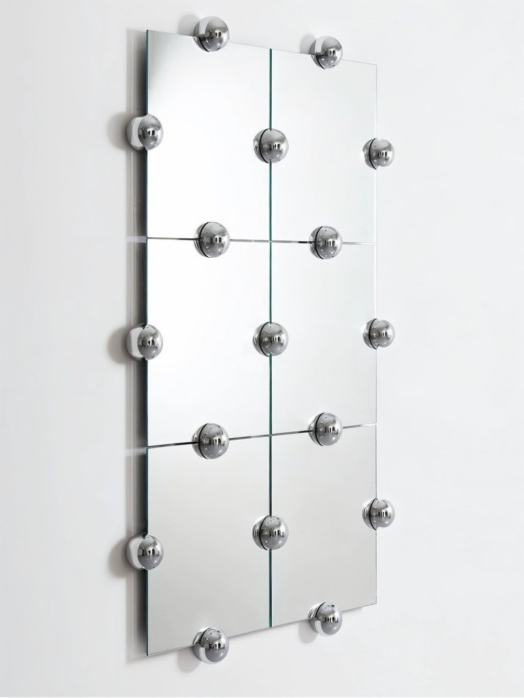 Moustache Sphera Crystal Palace L Vertical Mirror, a close-up, angled view of the elegant modular mirror, showcasing its six square panels and the intricate polished chrome spherical fasteners.