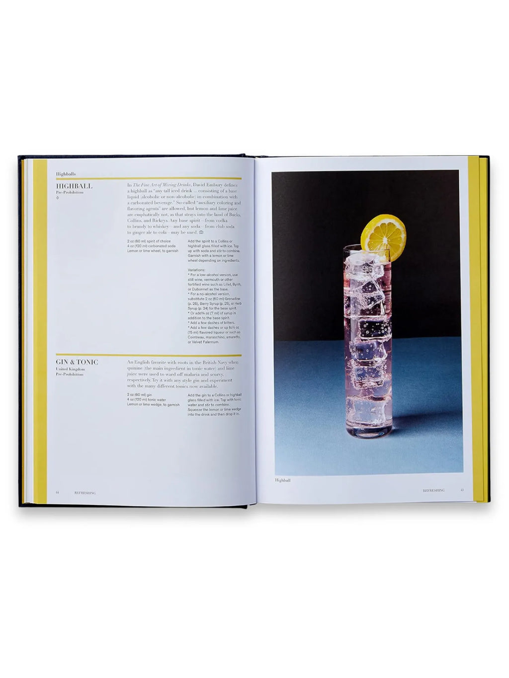 Book Spirited, an open hardcover cocktail recipe book featuring a vibrant full-page image of a "Highball" drink in a tall glass with ice and a lemon slice. This essential cocktail guide is perfect for aspiring mixologists and home bar enthusiasts learning classic drink recipes.