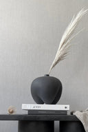  Close-up of Sumo Vase - Mini showcasing its unique geometric shape
