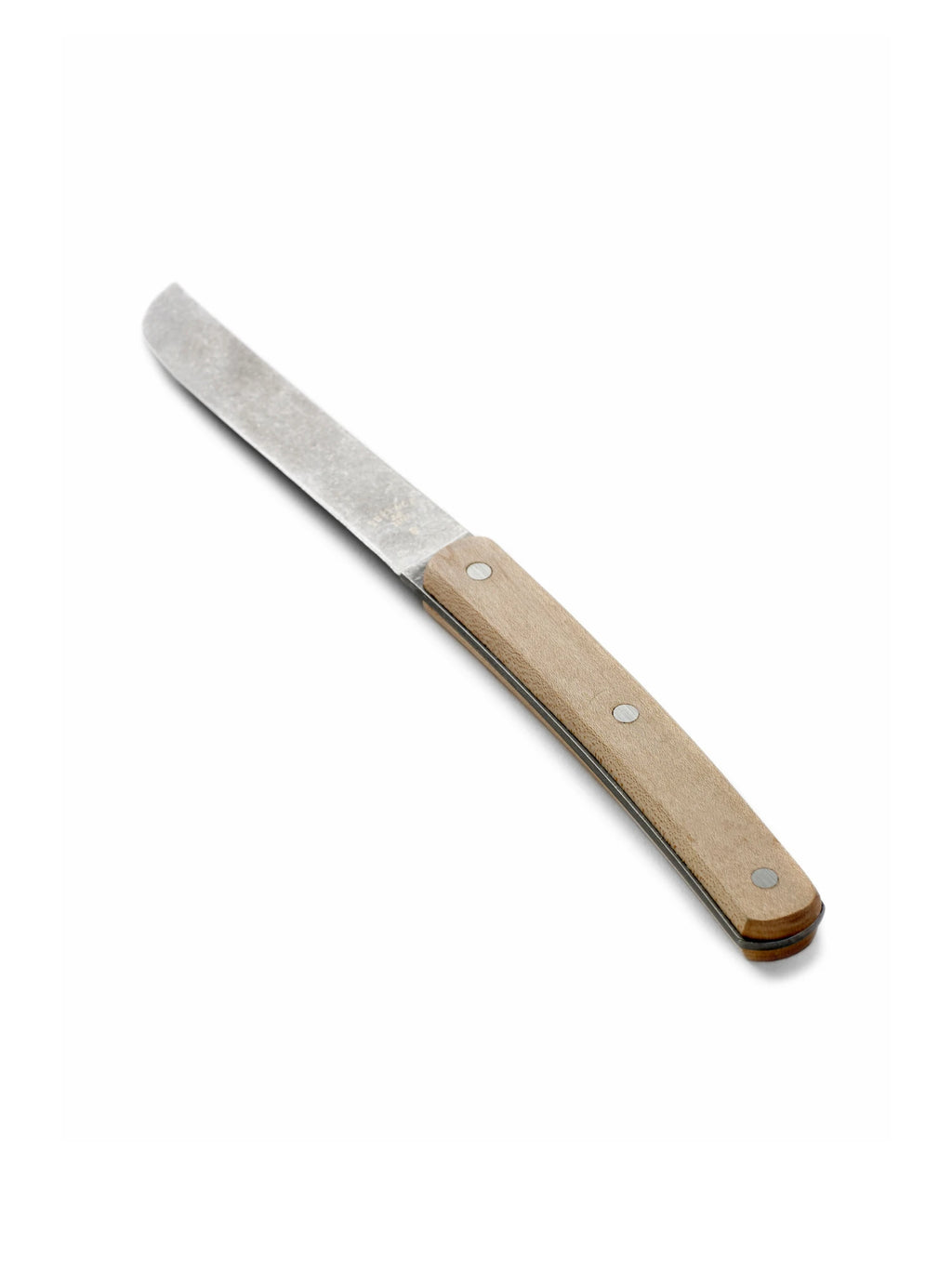Serax Surface Steak Knife - Set of 4, a single durable steak knife with a textured, matte silver blade and a light brown wooden handle secured by three visible silver rivets. This high-quality utensil is perfect for home chefs and culinary enthusiasts seeking a reliable cutting tool for meat.