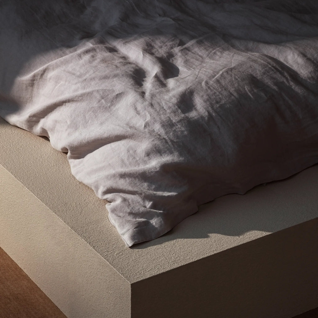  Merrow Duvet Cover styled with coordinating pillows and throws for a cohesive look 