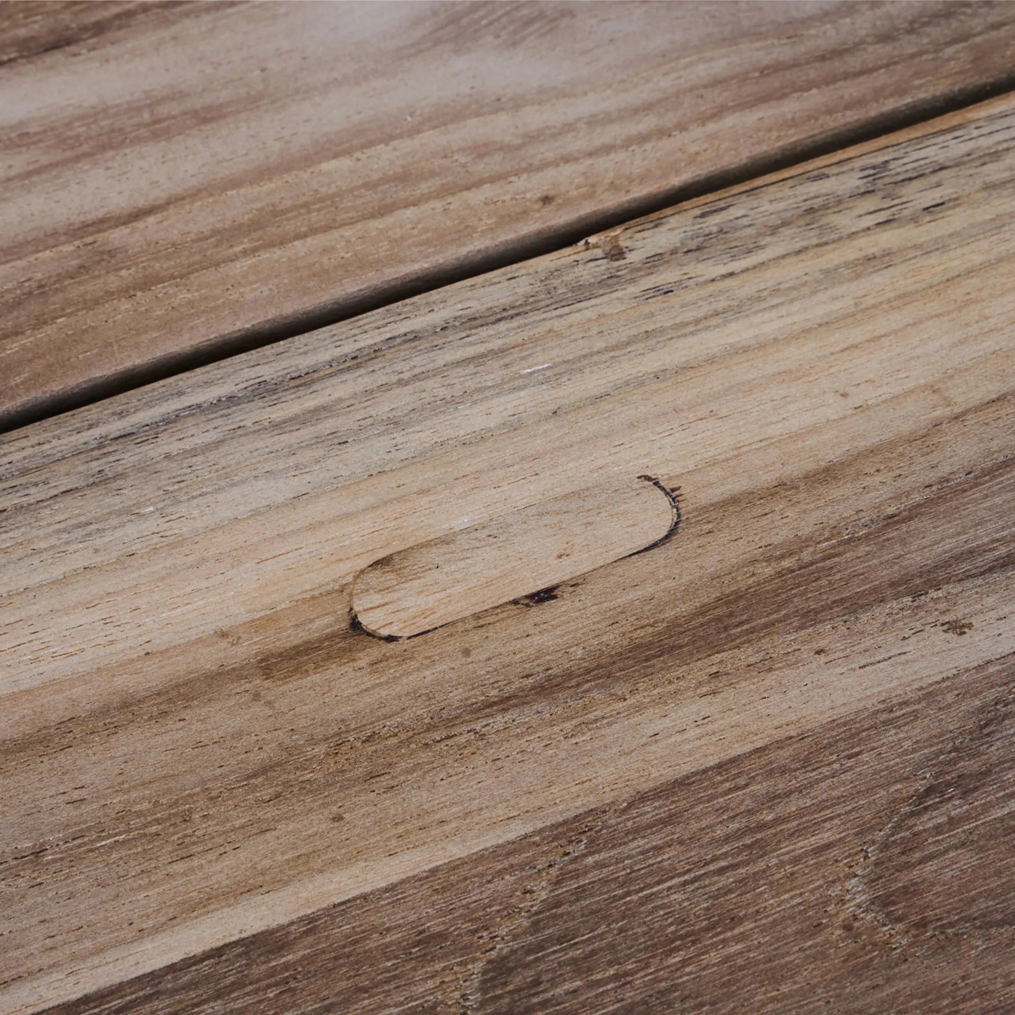 Large, sturdy outdoor dining table crafted from reclaimed teak wood
