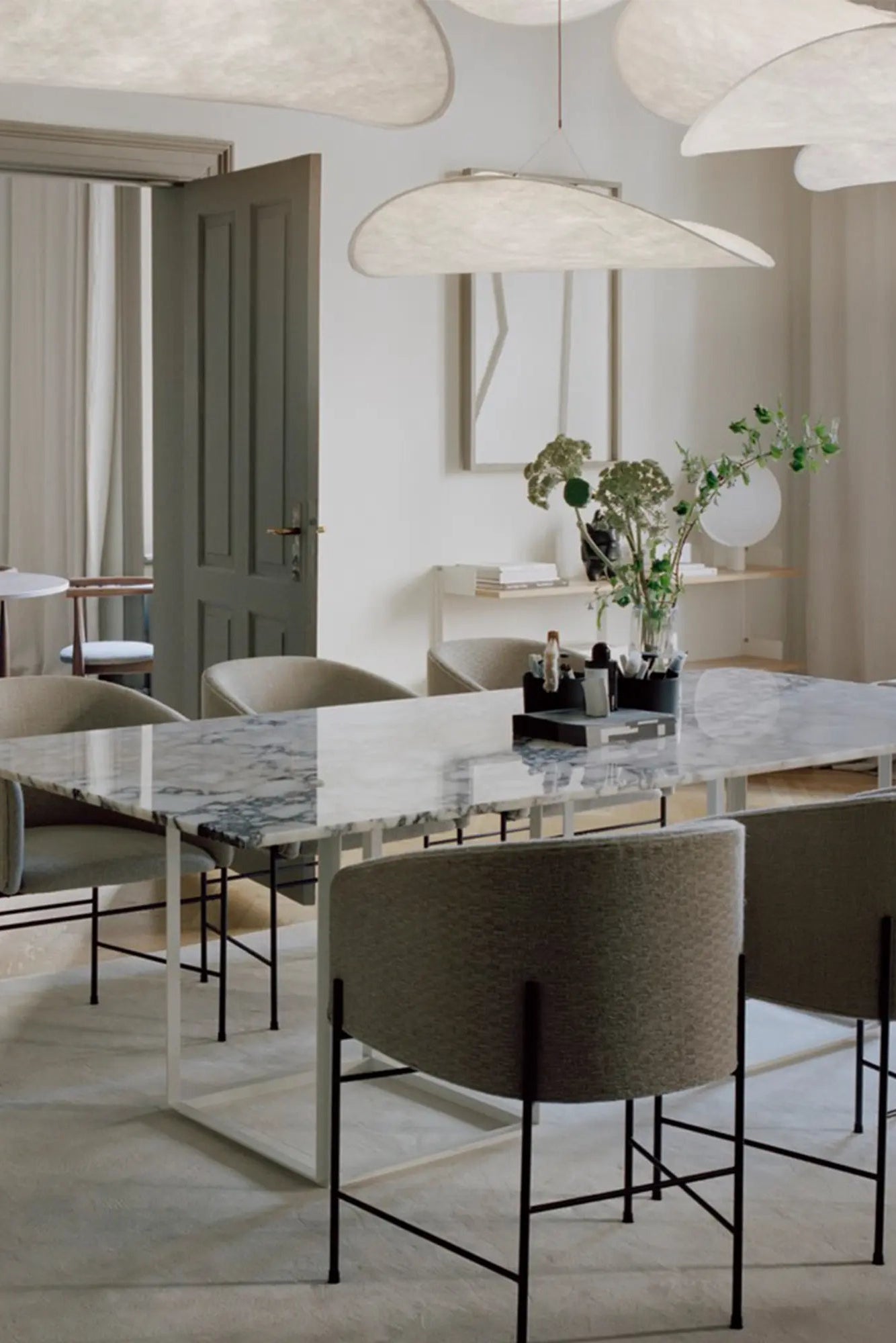 Tense Pendant Lamp with geometric shape creating striking focal point in entryway