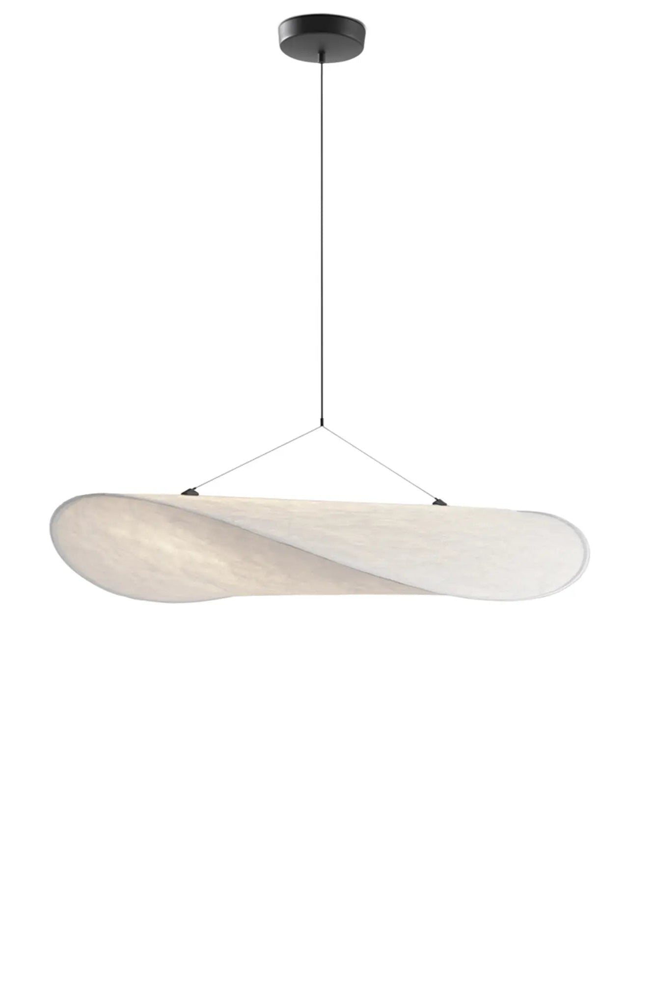 Tense Pendant Lamp providing gentle overhead illumination in industrial loft space
