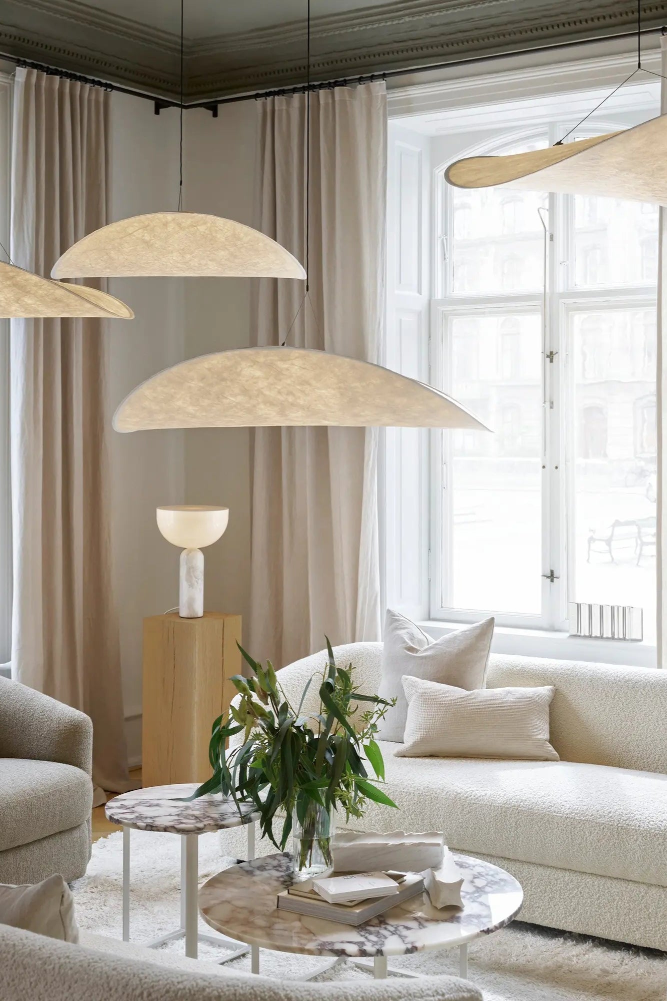 Minimalist Tense Pendant Lamp adding warm ambiance to bedroom decor