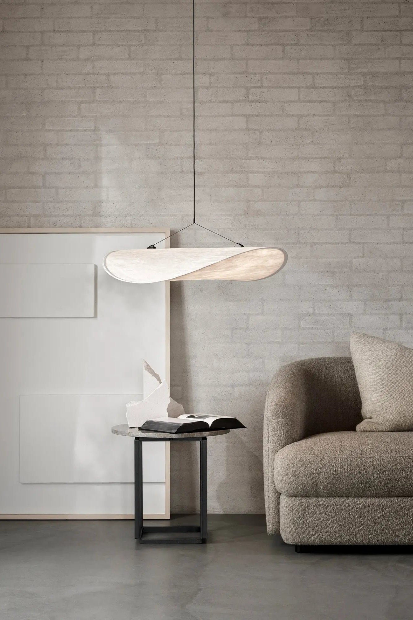 Elegant Tense Pendant Lamp with adjustable height and sleek design