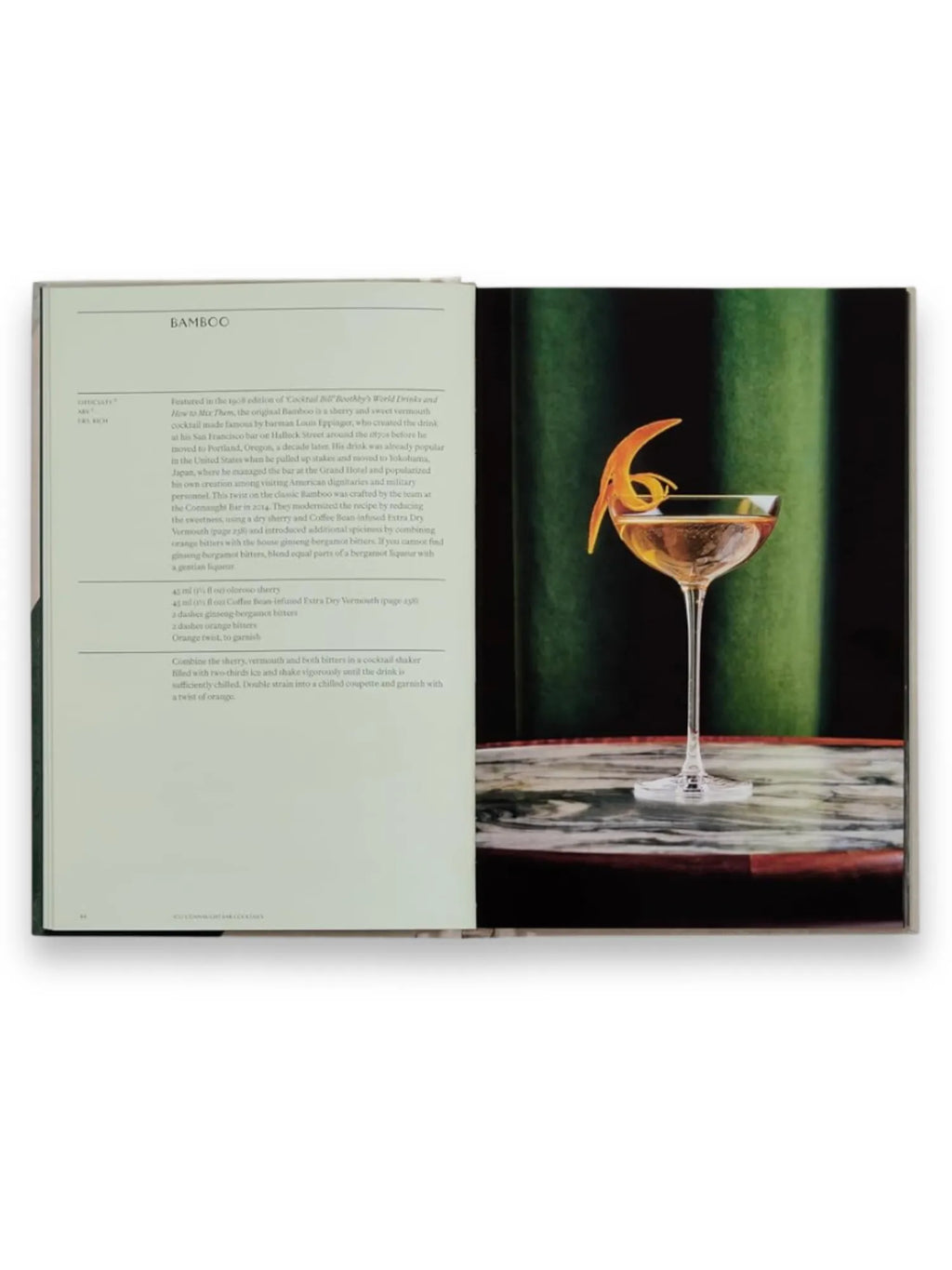 Book The Connaught Bar, an open cocktail recipe book displaying the "Bamboo" drink recipe text on the left page and a beautifully styled cocktail on the right. This premium cocktail recipe book is perfect for home mixologists and aspiring bartenders.