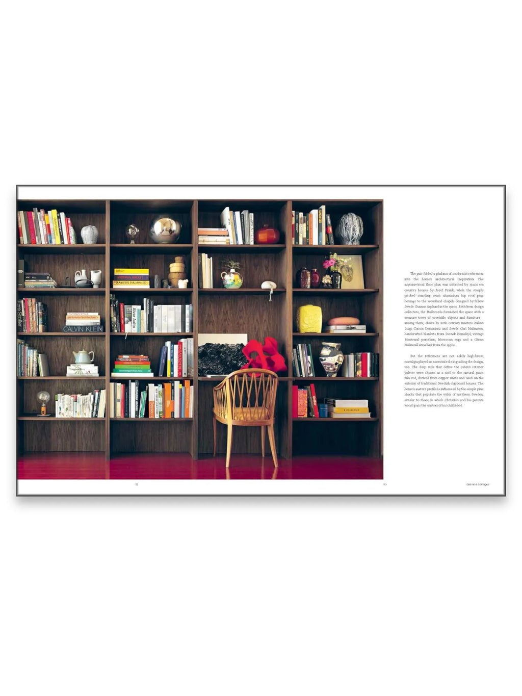 Book The Design Retreat, an open book spread featuring a rich dark wood bookshelf with diverse books and decorative objects, set against a vibrant red floor. This inspiring design book is perfect for interior design enthusiasts and modern architecture readers seeking creative home decor ideas.