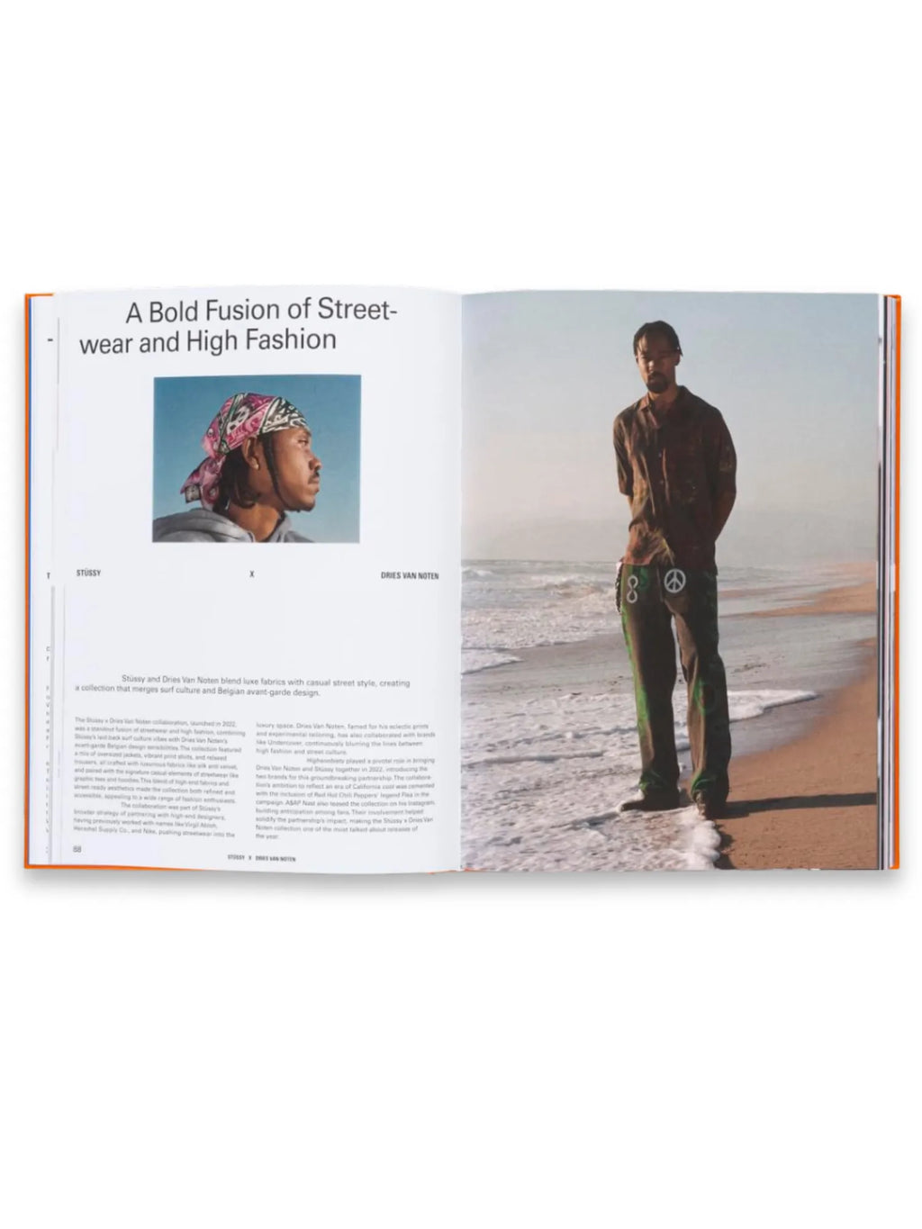 Book The Incomplete Vol. 2, an open-faced physical book showcasing a spread titled "A Bold Fusion of Streetwear and High Fashion," featuring an image of a person standing on a beach with foamy waves, wearing a patterned shirt and dark pants with white peace signs and green accents, alongside text detailing a collaboration between Stüssy and Dries Van Noten. This design and fashion book is perfect for fashion enthusiasts and design students interested in streetwear and high fashion trends.
