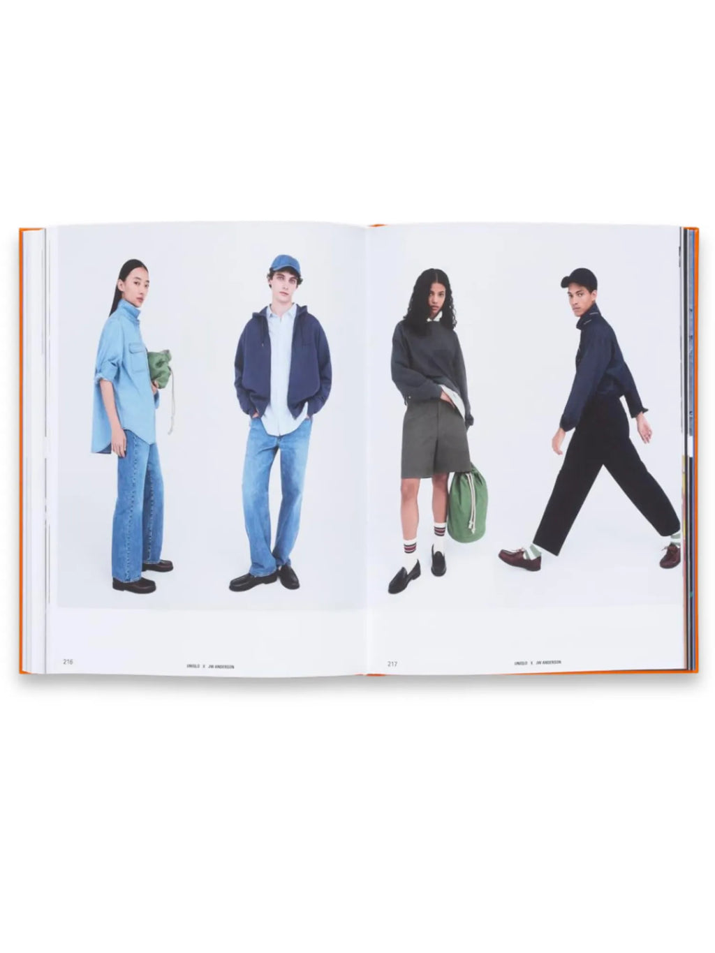 Book The Incomplete Vol. 2, an open art book displaying two pages with four models showcasing stylish, modern fashion, including denim shirts, hoodies, shorts, and trendy accessories like hats and bags, all against a clean white background. This visual fashion catalog is perfect for style enthusiasts and design professionals seeking inspiration and contemporary apparel trends.