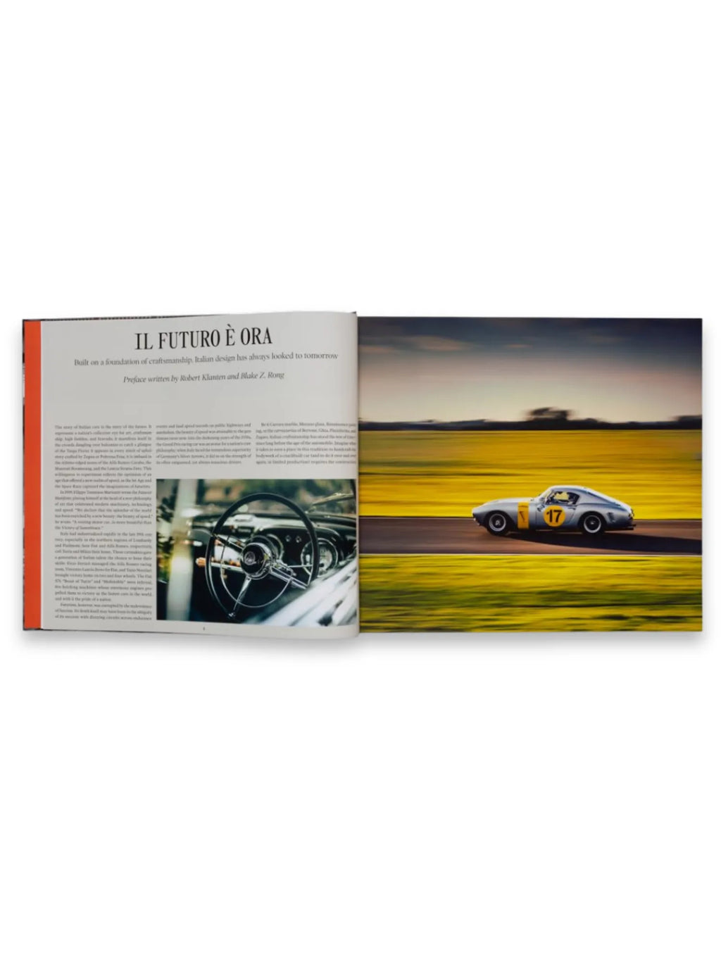 Book The Italians - Beautiful Machines, an open hardcover book displaying a classic silver Italian racing car with number "17" on a track, blurred yellow fields, and a close-up of a vintage car steering wheel. This premium automotive history book is perfect for classic car enthusiasts and design aficionados.