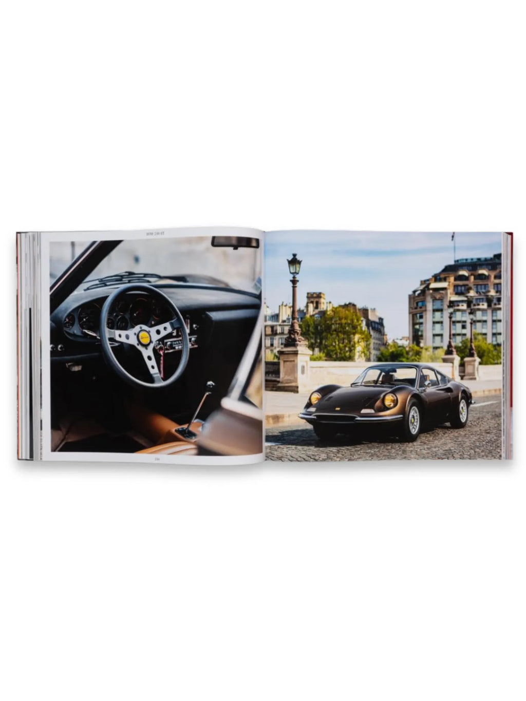 Book The Italians - Beautiful Machines, open to a two-page spread featuring luxury Italian cars. The left page displays a detailed interior shot of a vintage sports car with a classic steering wheel and brown leather, while the right page shows a sleek dark bronze sports car parked on a cobblestone street with classic European architecture in the background. This premium automotive photography book is perfect for car enthusiasts and collectors of Italian car history.