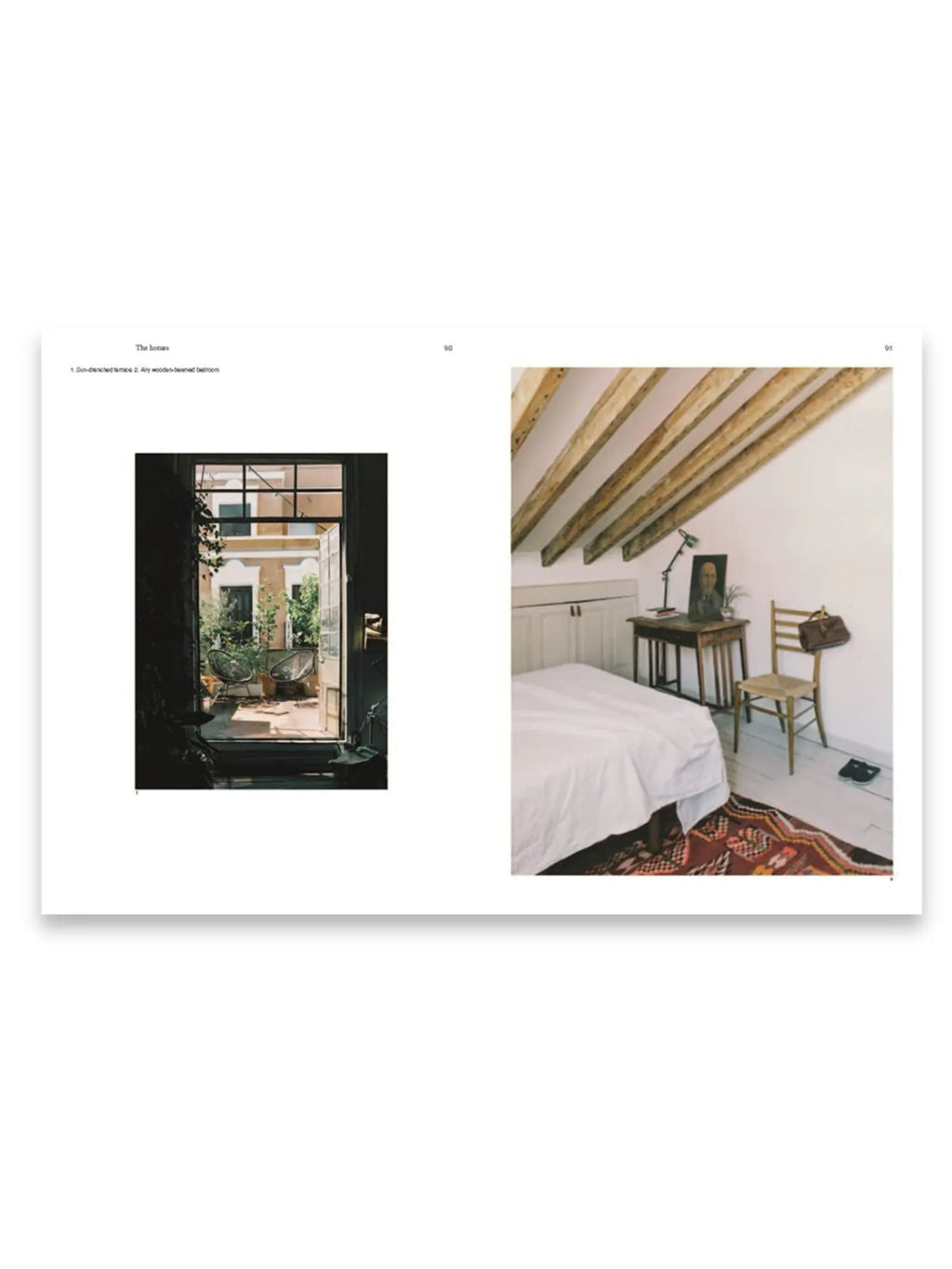 Book The Monocle Book of Homes, showcasing an open spread with two distinct interior design images: a sun-drenched terrace with lush plants and a cozy bedroom featuring rustic wooden beams and a patterned rug. This lifestyle and interior design book is perfect for decor enthusiasts seeking inspiration for stylish living spaces.