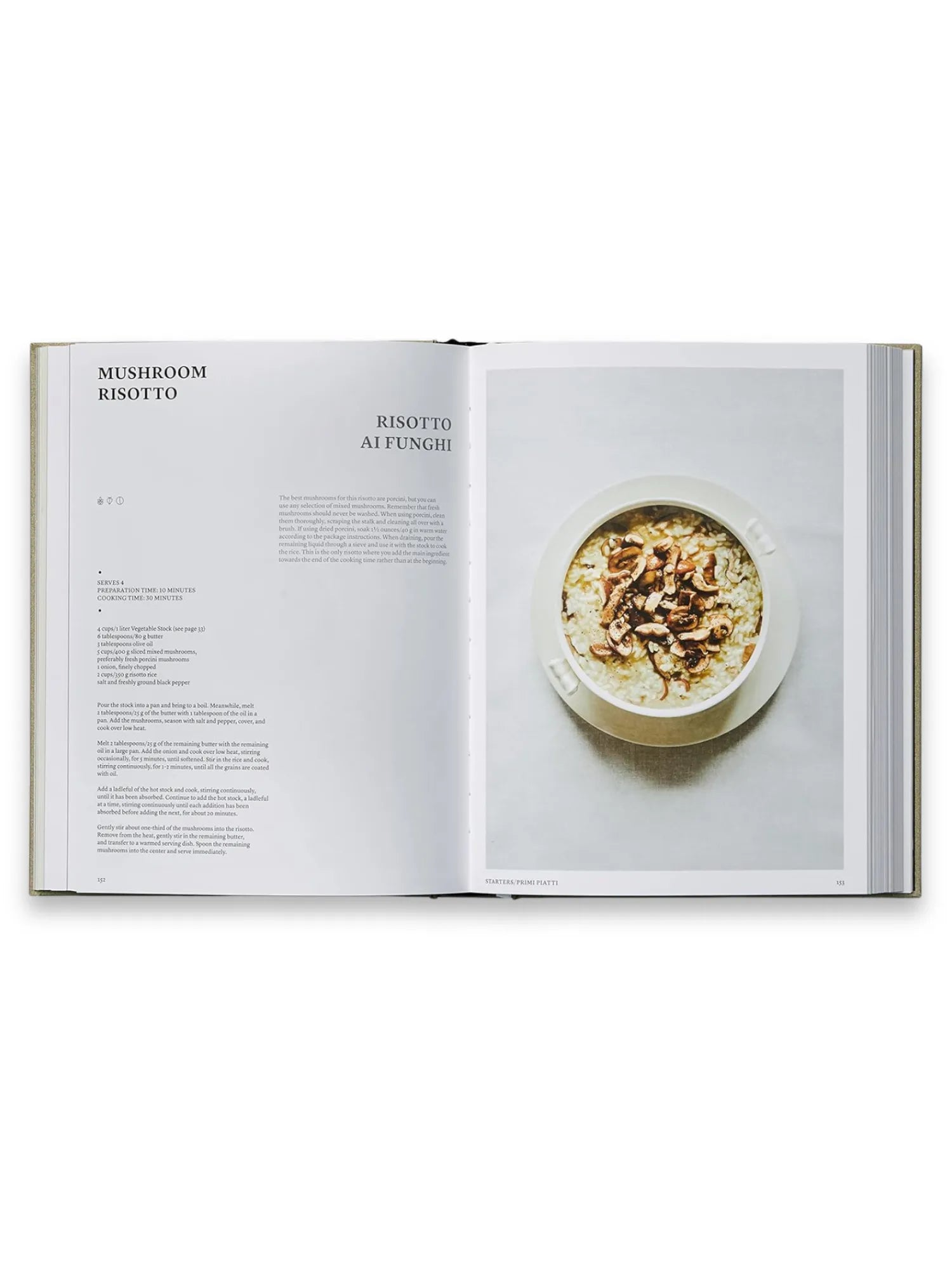 Book The Silver Spoon, an open cookbook displaying a "Mushroom Risotto" recipe with a vibrant photo of the finished dish in a white bowl, showcasing an elegant and authentic Italian culinary experience. This premium cookbook is perfect for home chefs and cooking enthusiasts seeking traditional Italian recipes and culinary inspiration.