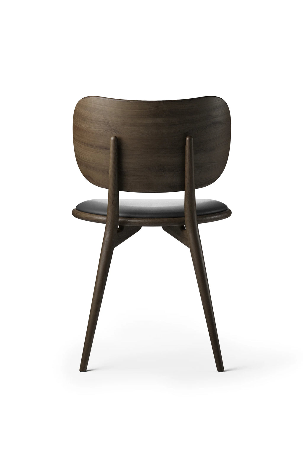 Mater The Dining Chair, a sophisticated dark brown wooden dining chair with a curved backrest and a black leather padded seat, viewed from the back, highlighting its elegant craftsmanship and smooth finish, displayed on a clean white background.