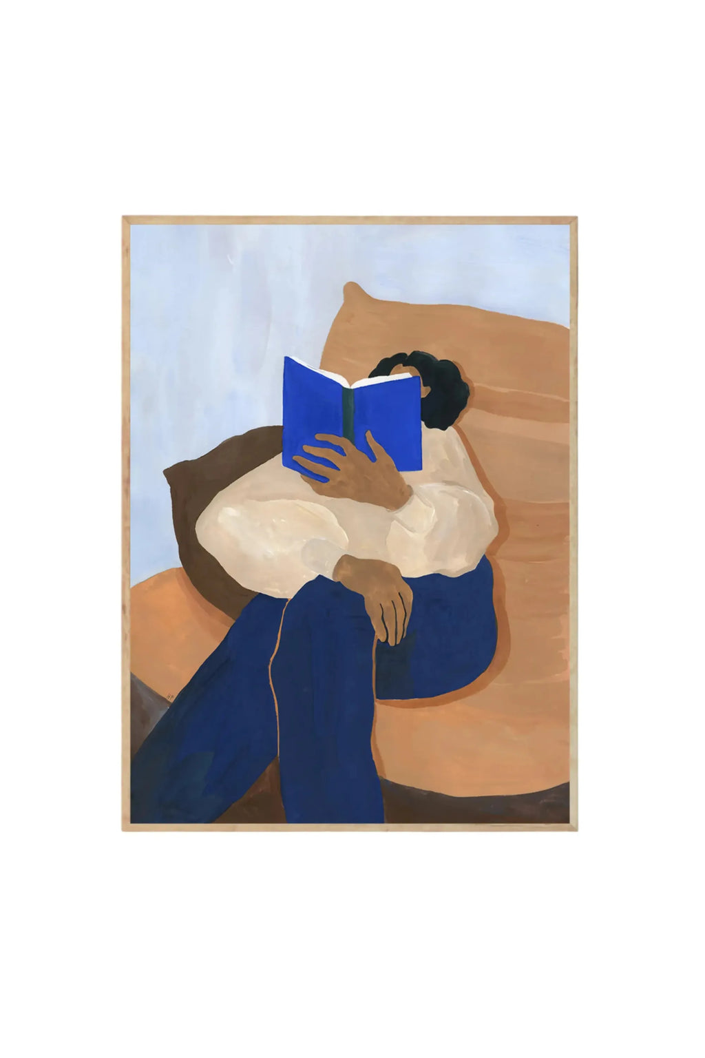 The Poster Club The Togo - Art Print, a modern abstract poster featuring a figure in an off-white top and blue pants, seated on a brown sofa, reading a vibrant blue book. This stylish art print is perfect for contemporary home decor and art enthusiasts seeking unique wall art.
