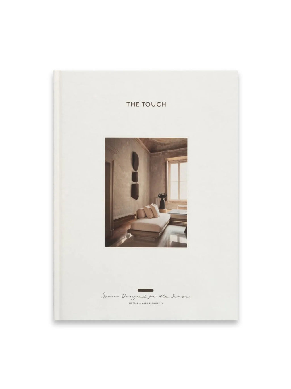 Book The Touch, minimalist hardcover book with a cream-colored cover and a central image of a stylish, warm-toned interior space with natural light. This elegant design book is perfect for interior design enthusiasts and professionals seeking inspiration.